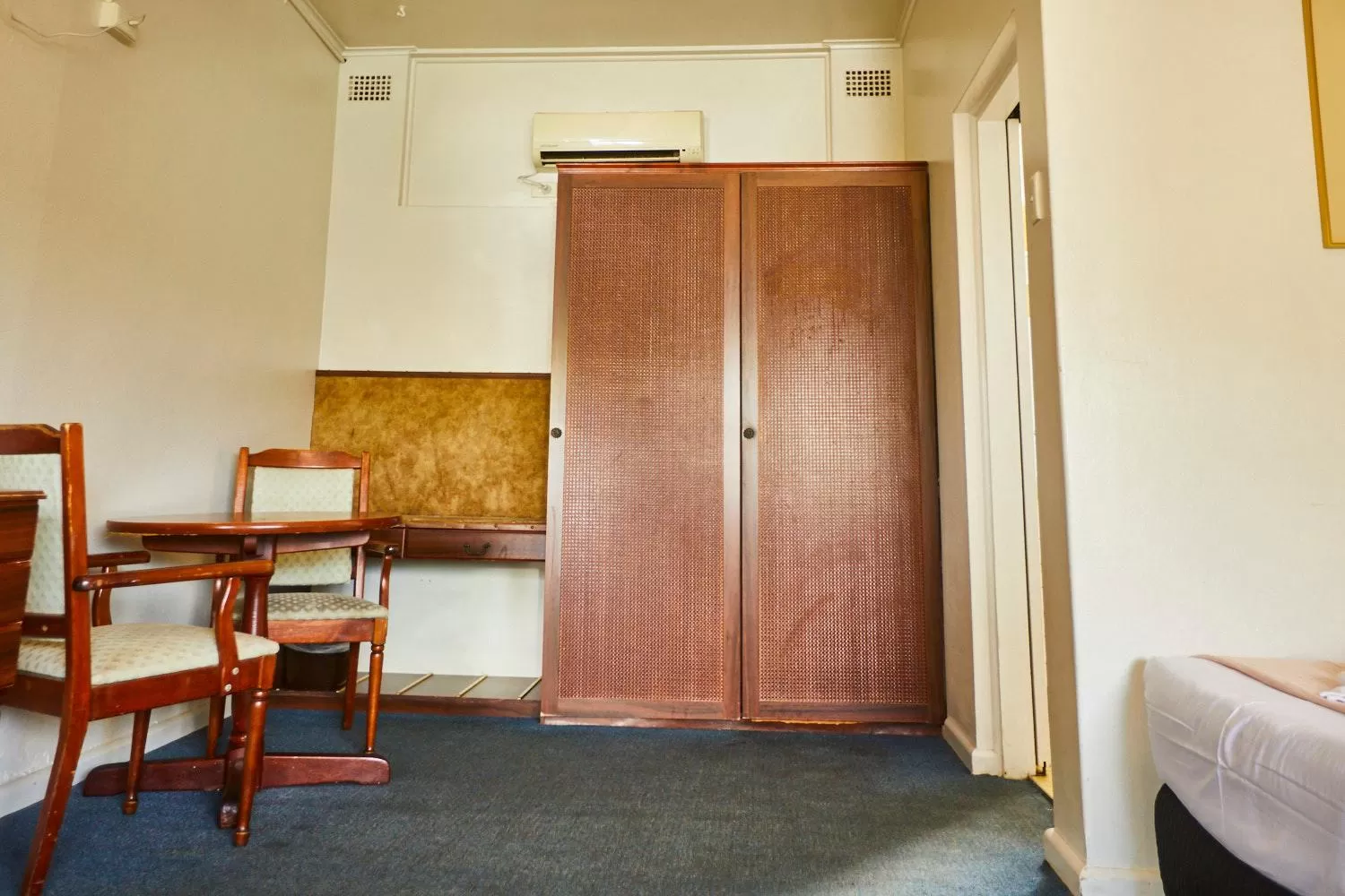 Bed in Town and Country Motel