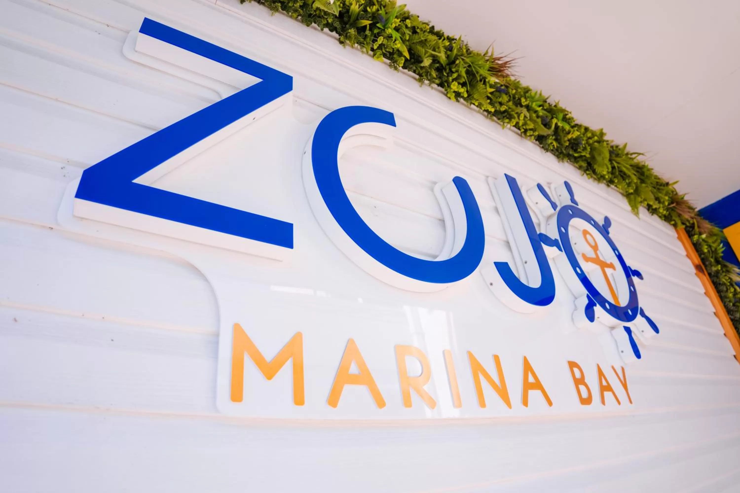 Property logo or sign in ZOJO MARiNA BAY