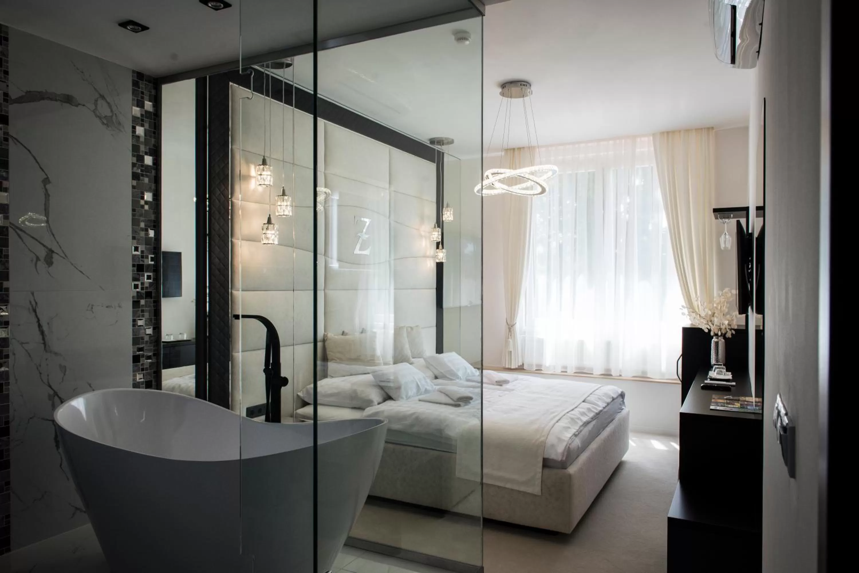 Photo of the whole room, Bed in Z Rooms Boutique