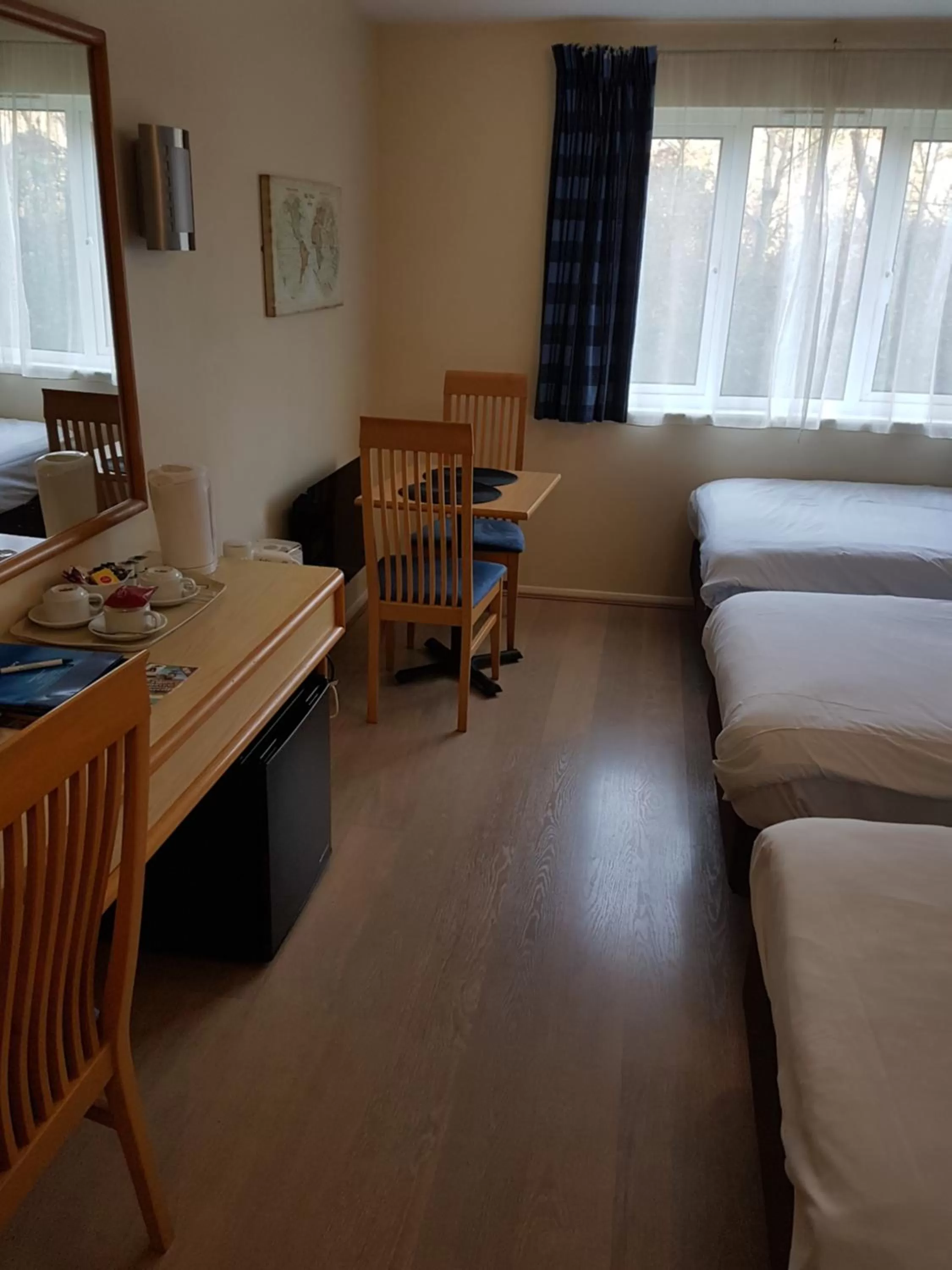 Bed in Travel Plaza Hotel