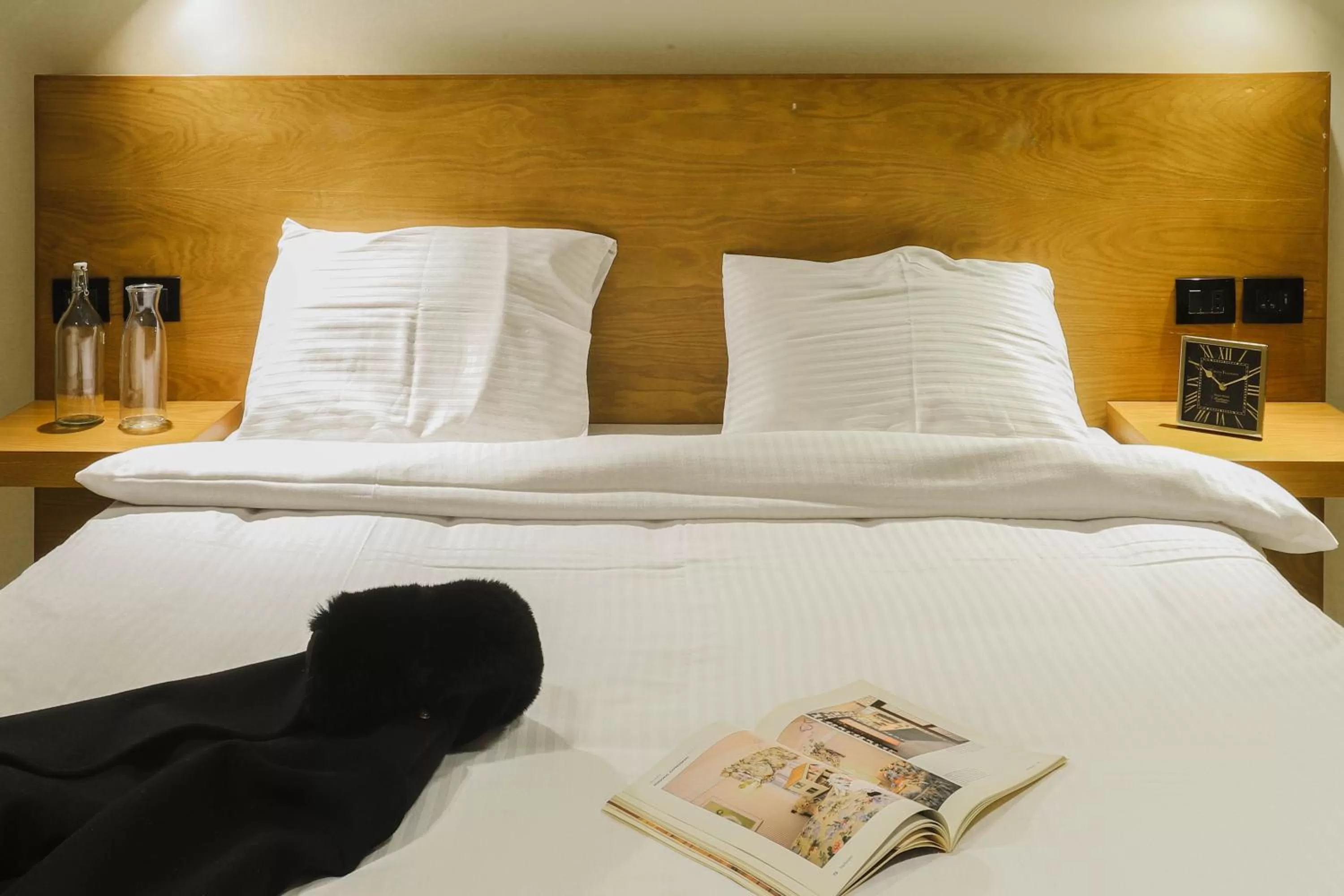 Bed in NewCity Hotel & Suites