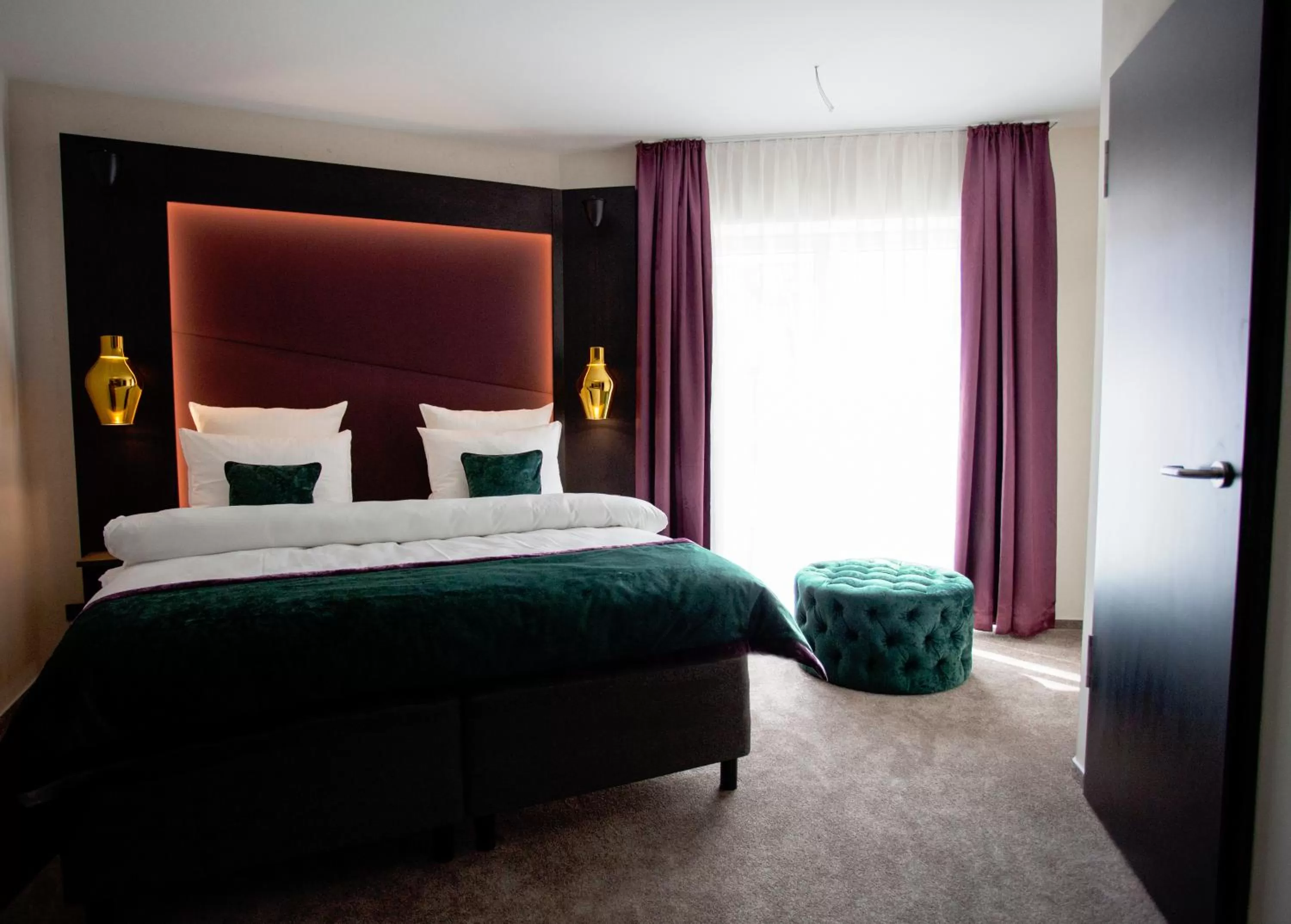 Bed in ONNO Boutique Hotel & Apartments