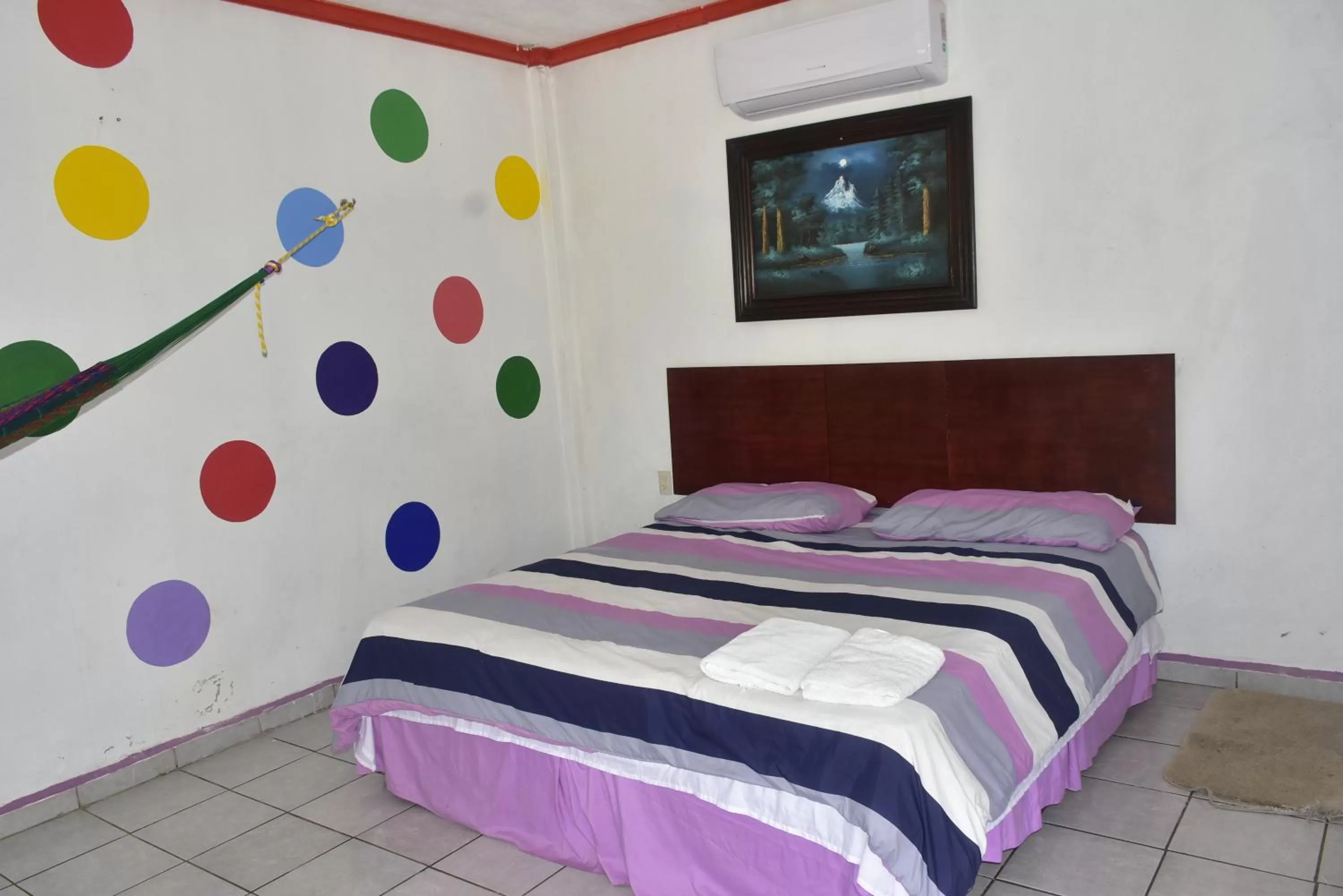 Bed in Hotel Bacaanda