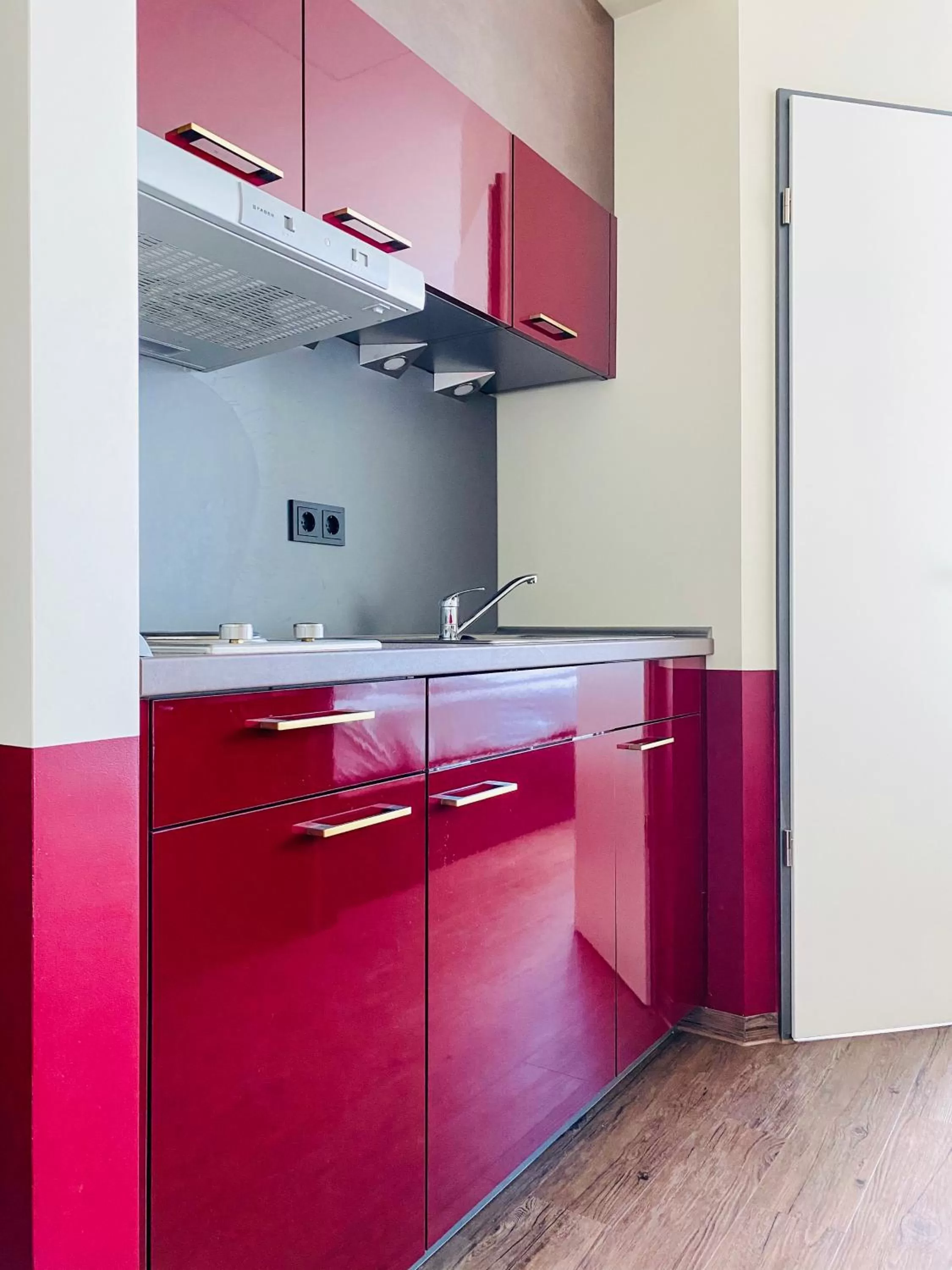 Kitchen or kitchenette in Base Apartments