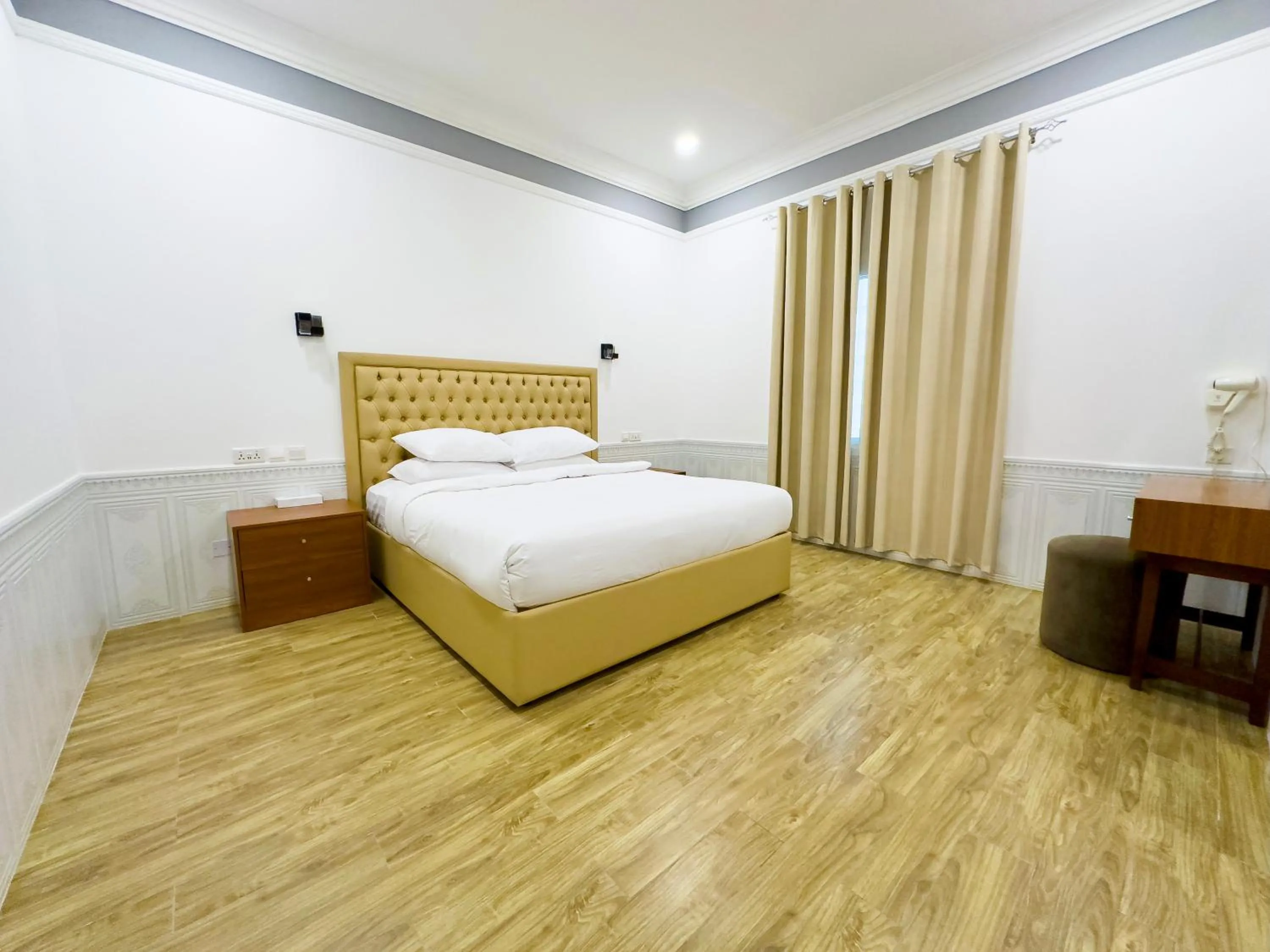 Bed in Royal Residence Hotel Apartments