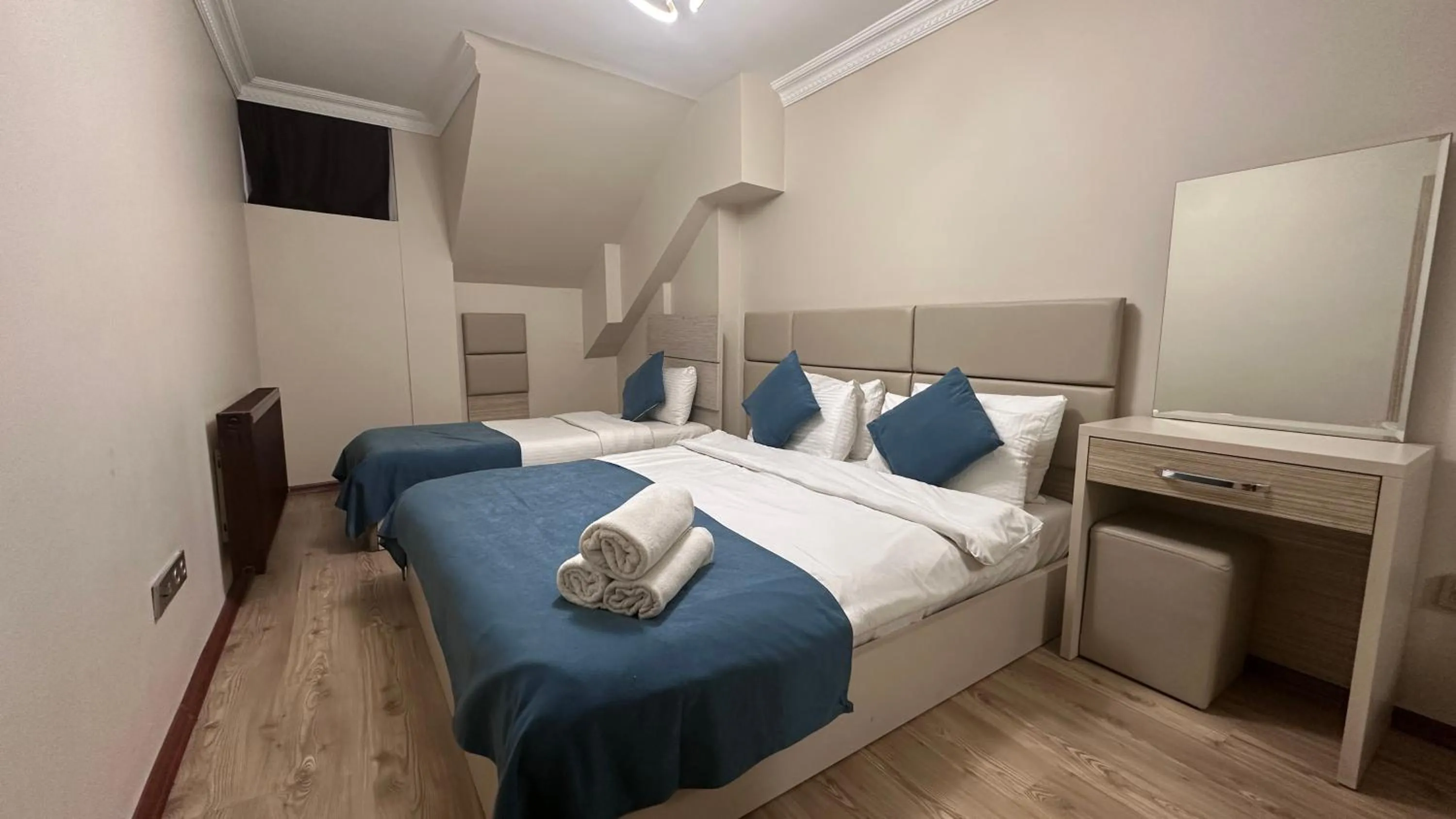 Bed in Overland Residence