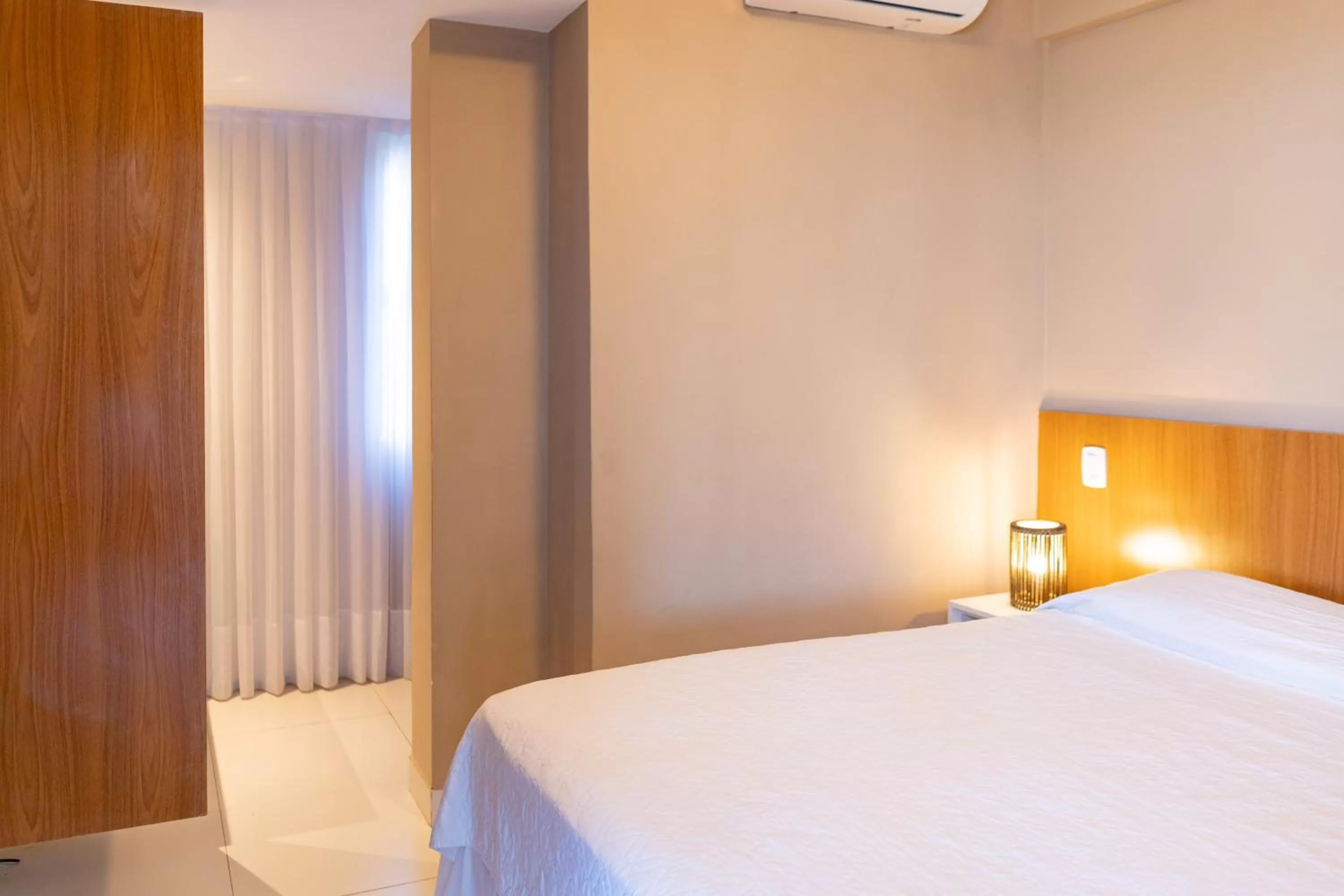 Bedroom, Bed in Porto Suítes Natal Hotel