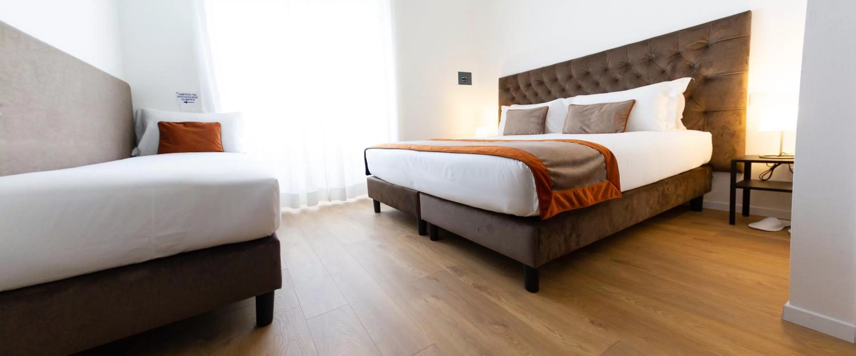 Bed in Michelangelo Vatican Rooms