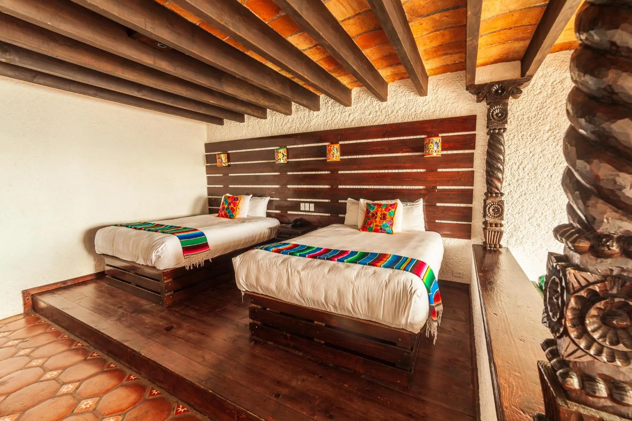 Bed in Las Rocas Resort & Spa