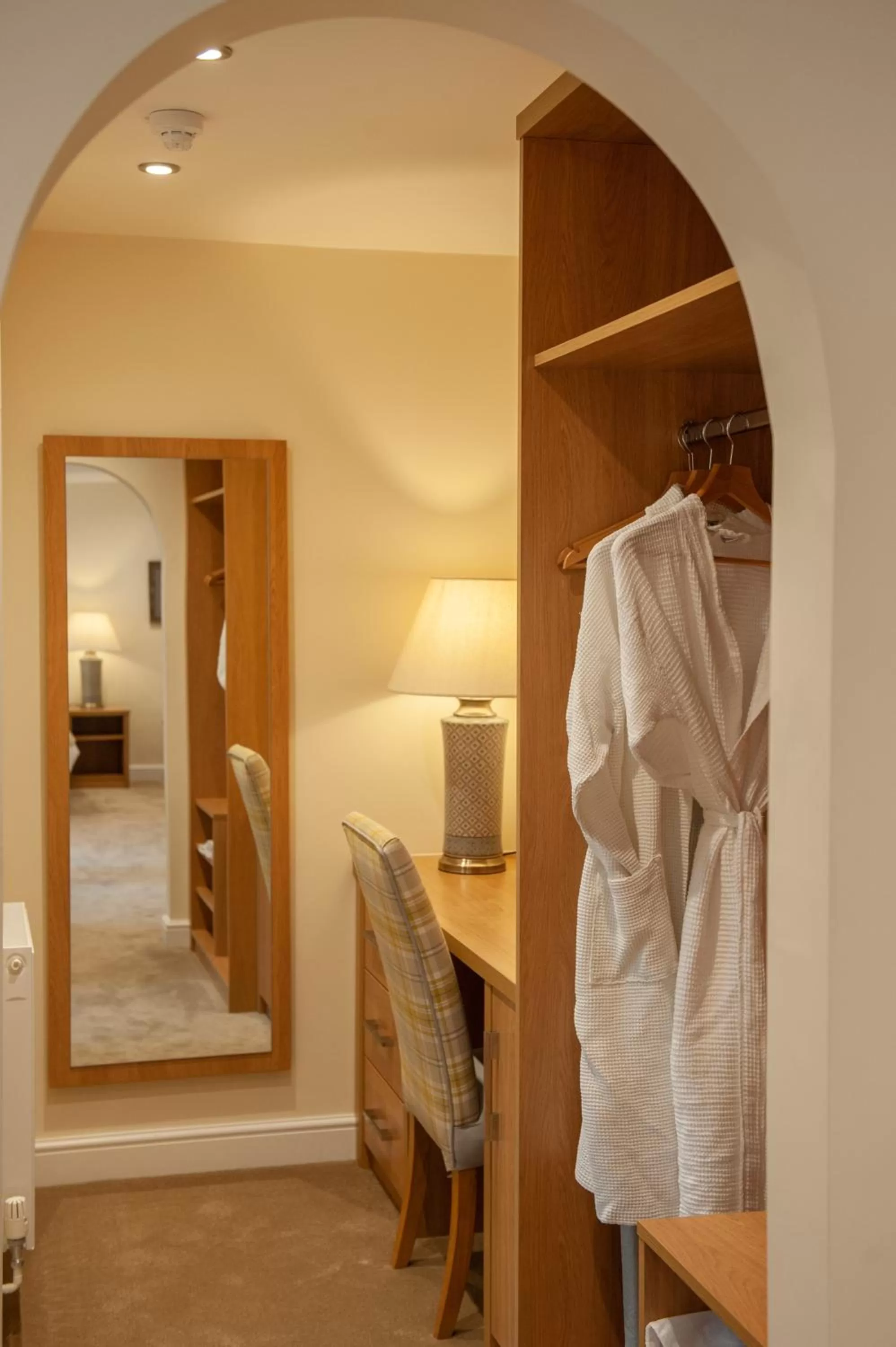wardrobe, Bed in The H Boutique Hotel