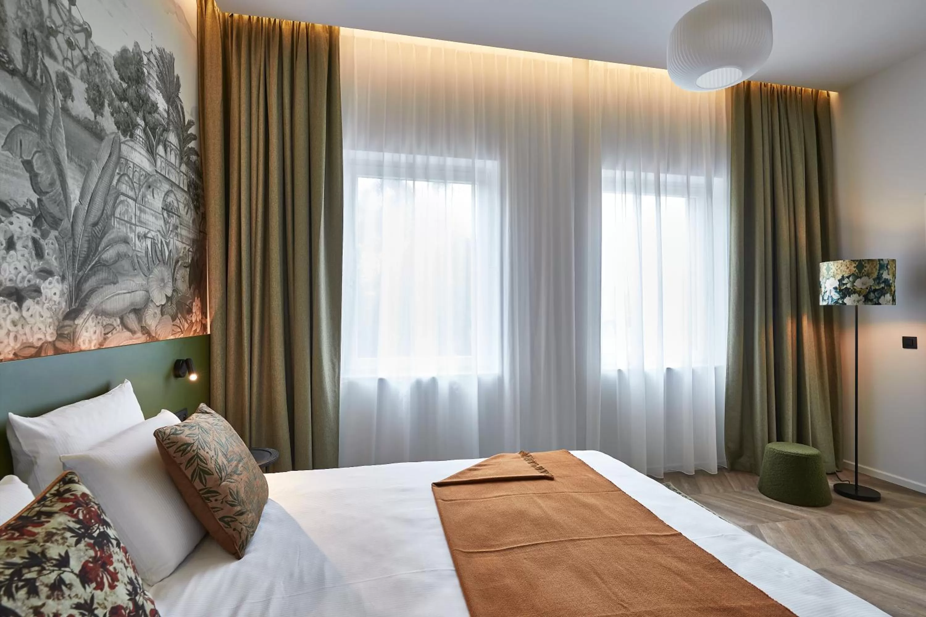 Bed in Urban Yard Hotel