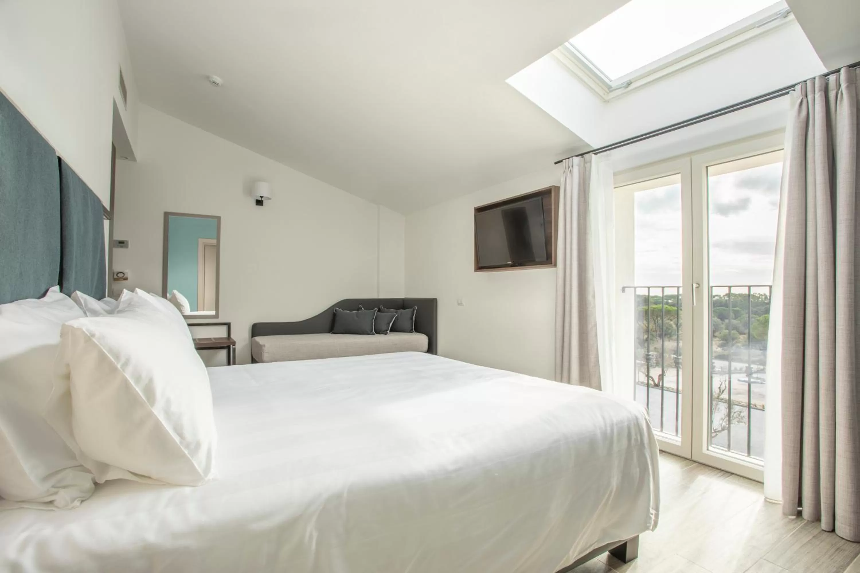 Bed in Riva Toscana Golf Resort & SPA