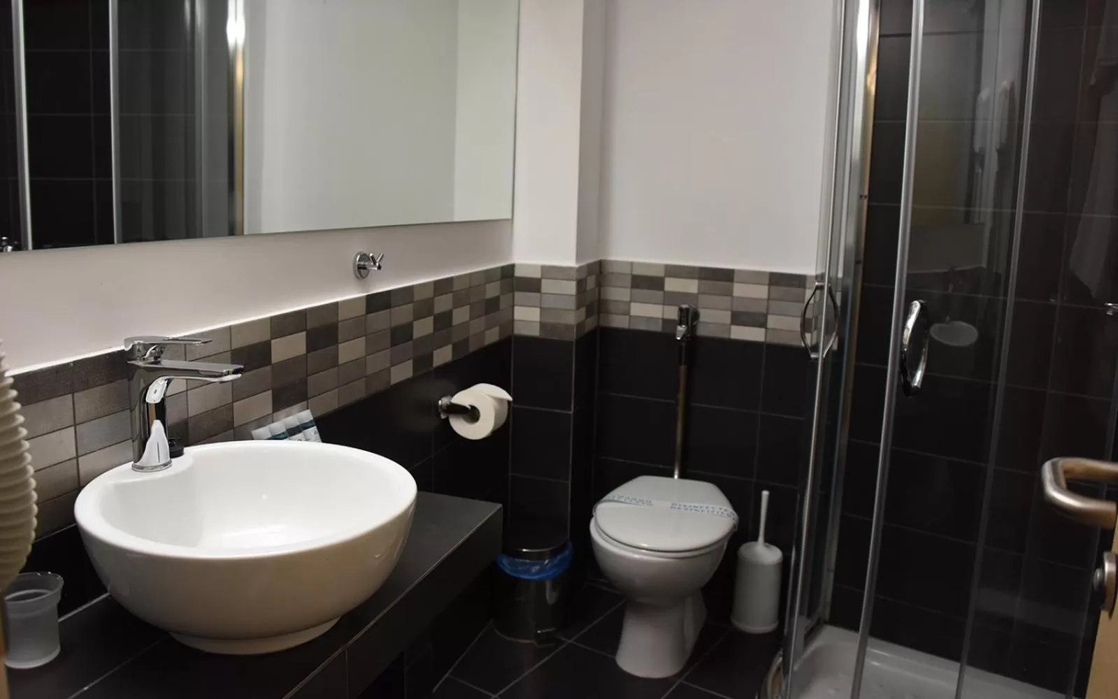 Bathroom in Dionisos Hotel