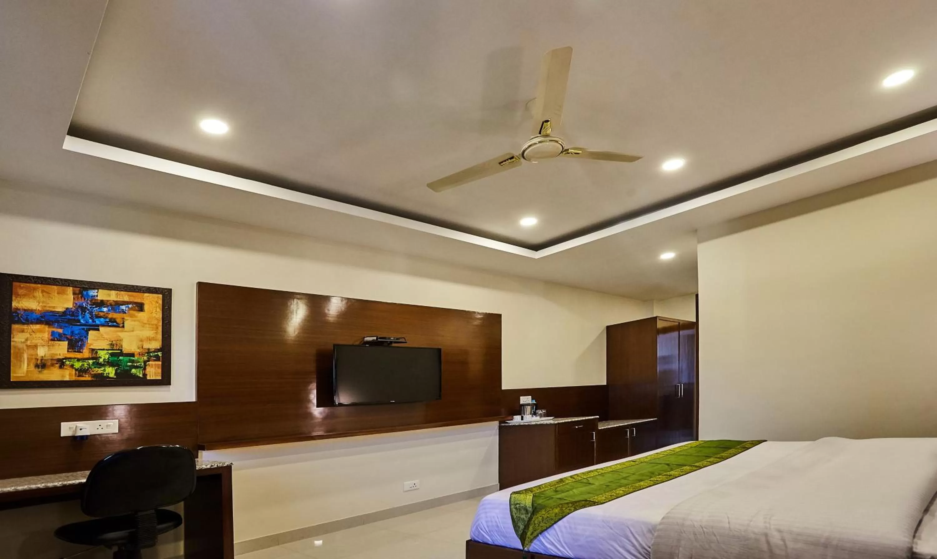 Bedroom, Bed in Treebo Grand Legacy Elite With Roof Top Cafe