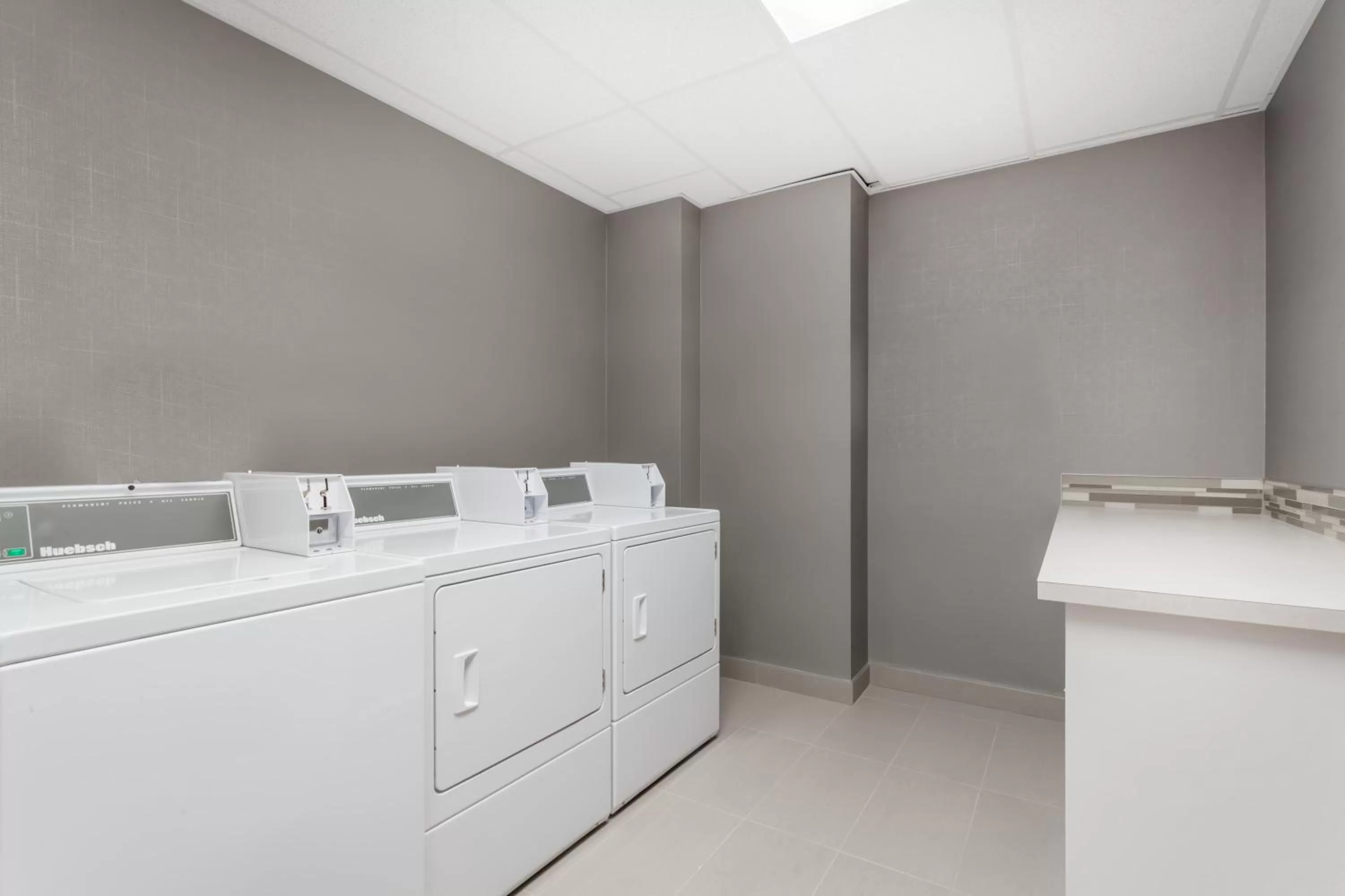 laundry in Best Western Plus Airdrie Gateway