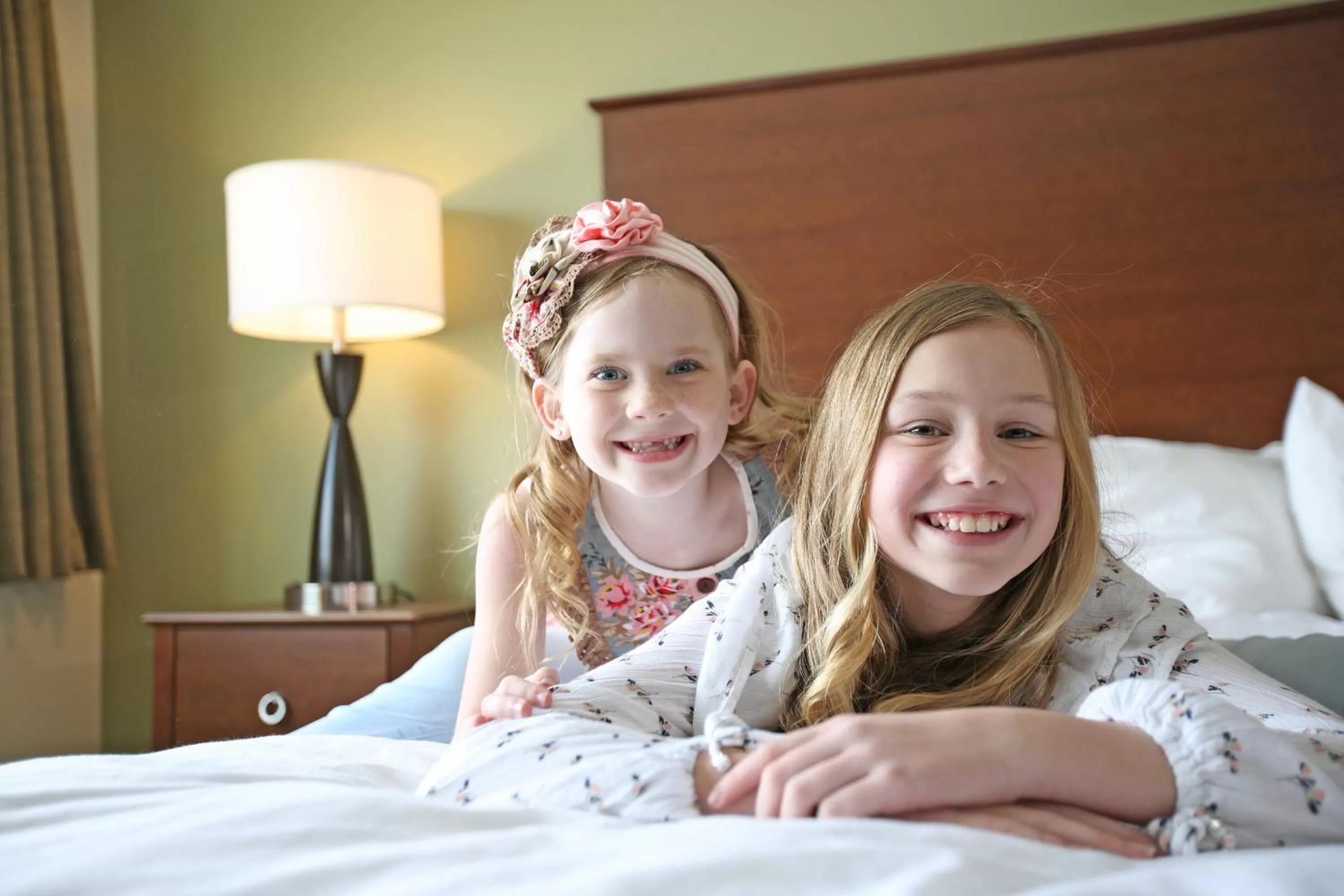 Bed in AmericInn by Wyndham Douglas/Saugatuck