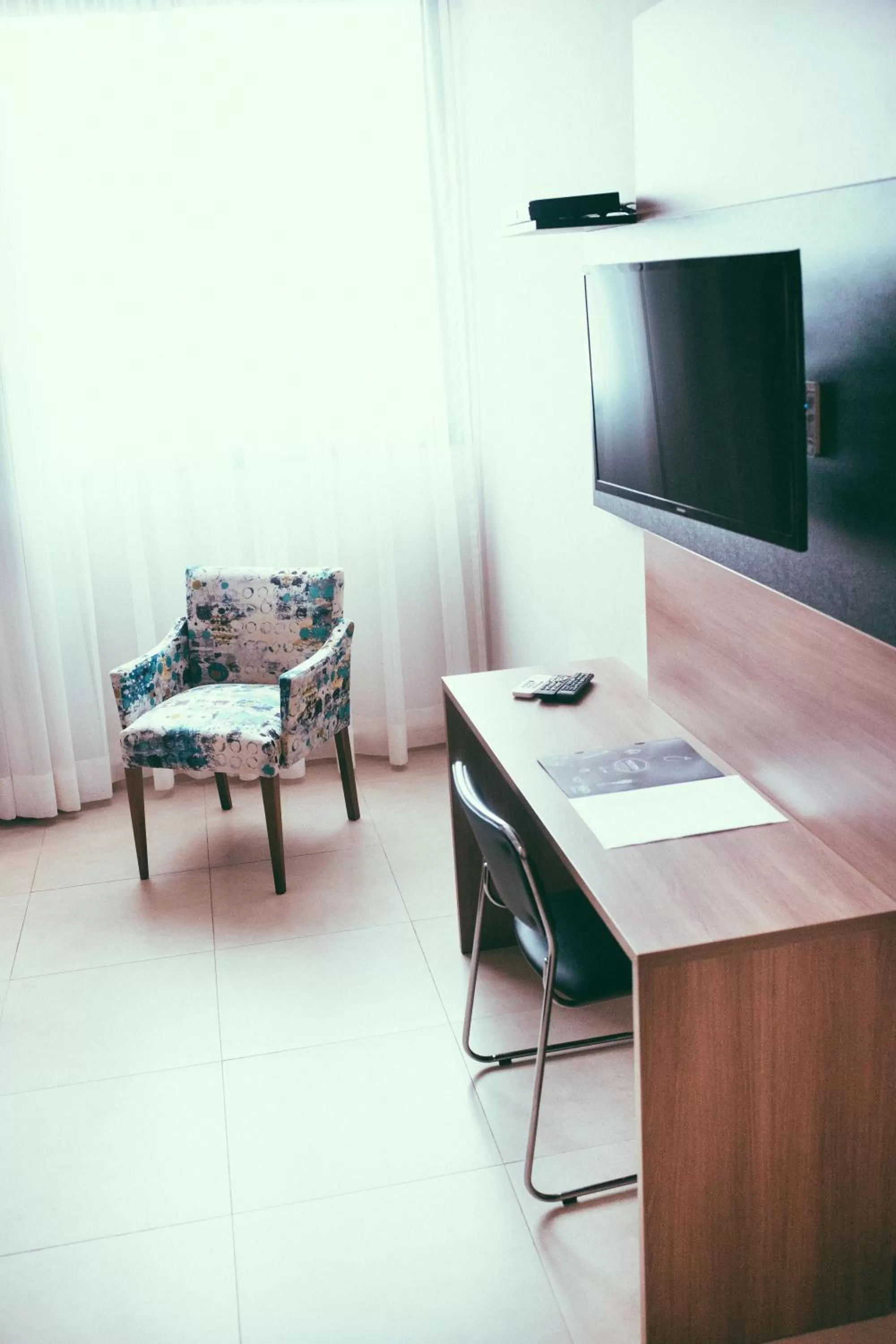 TV and multimedia in Occitano Apart Hotel