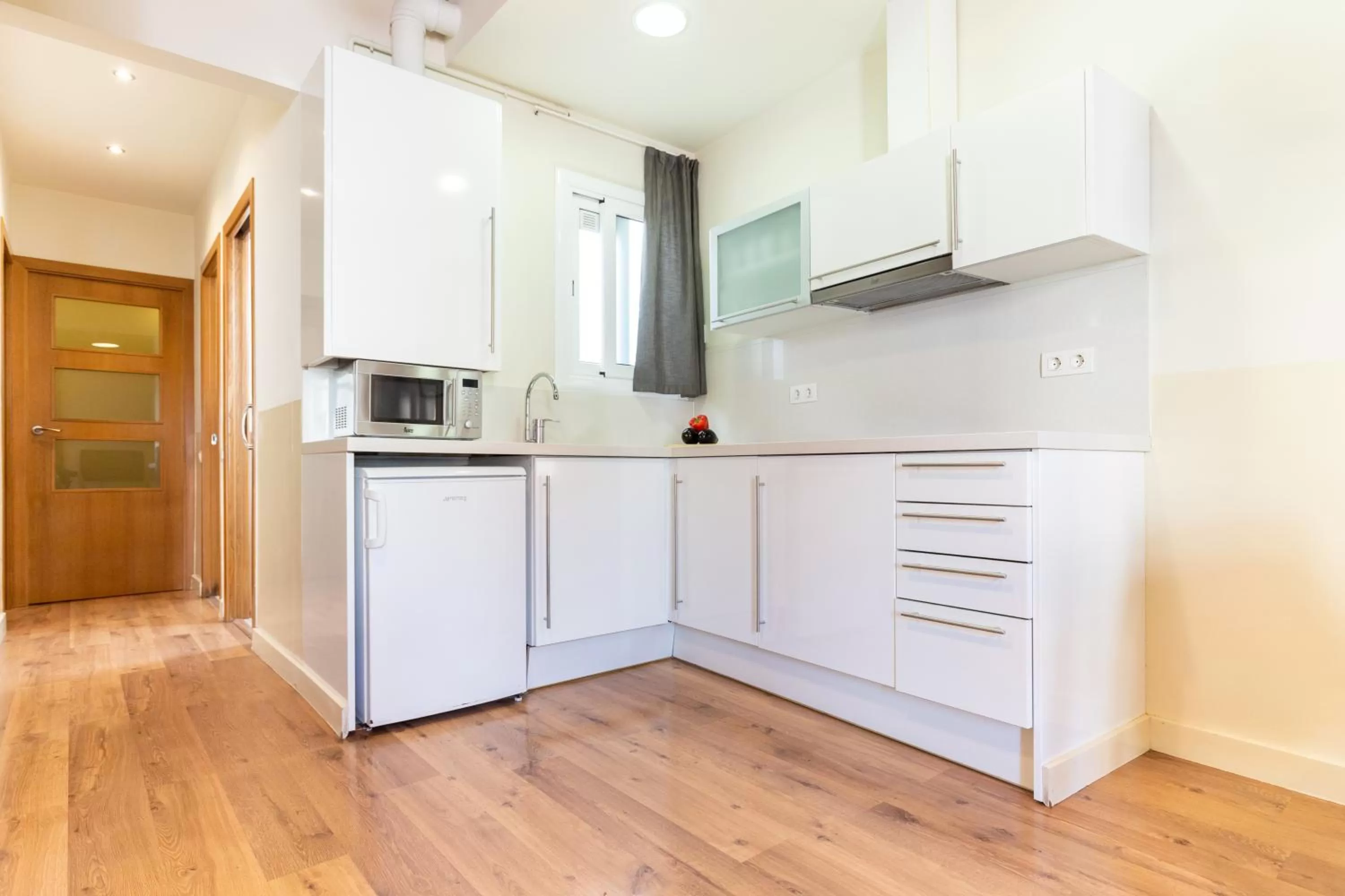 Kitchen or kitchenette in Atica Apartments - by Weflating