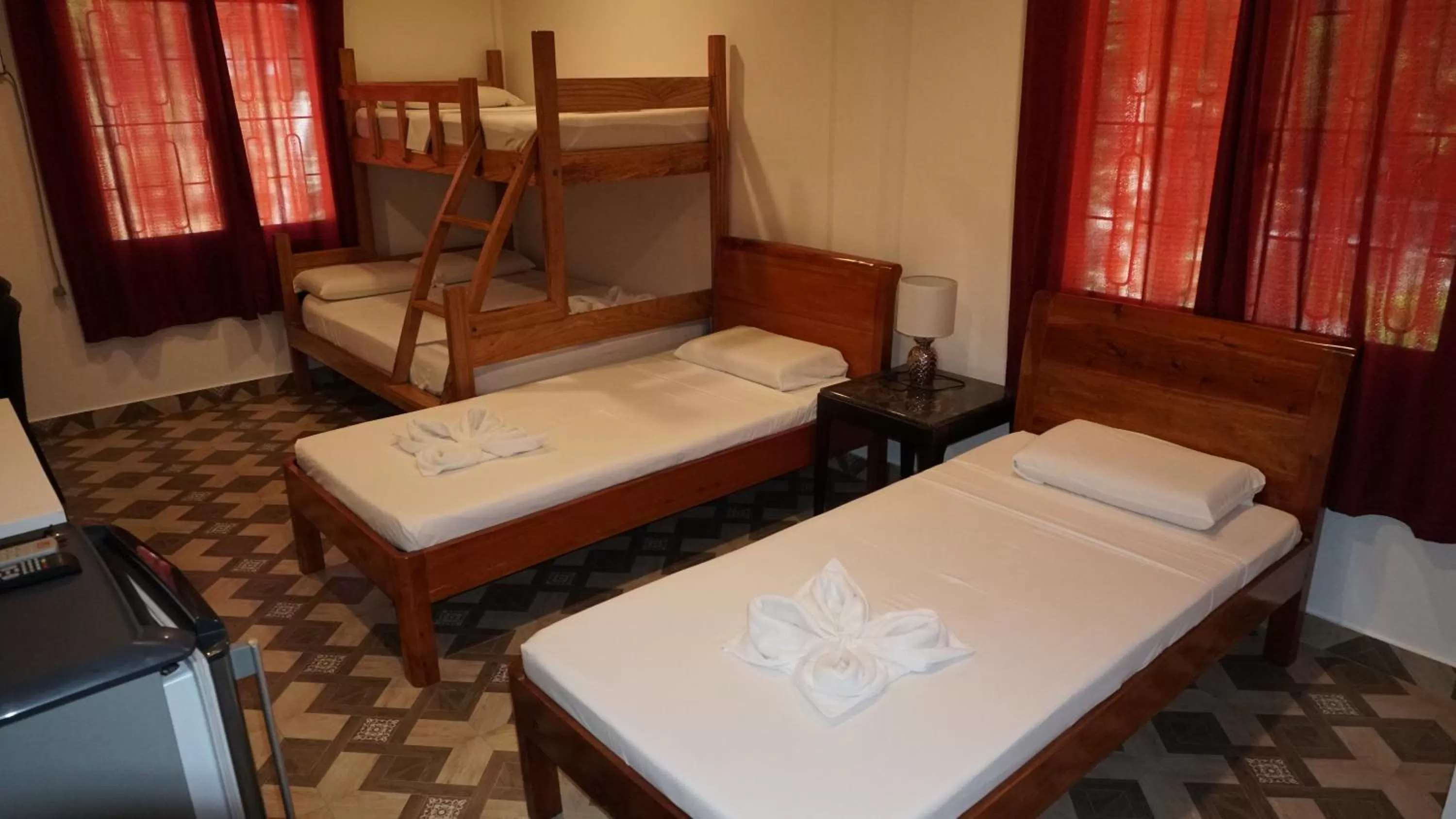 Bed in Wellbeach Dive Resort