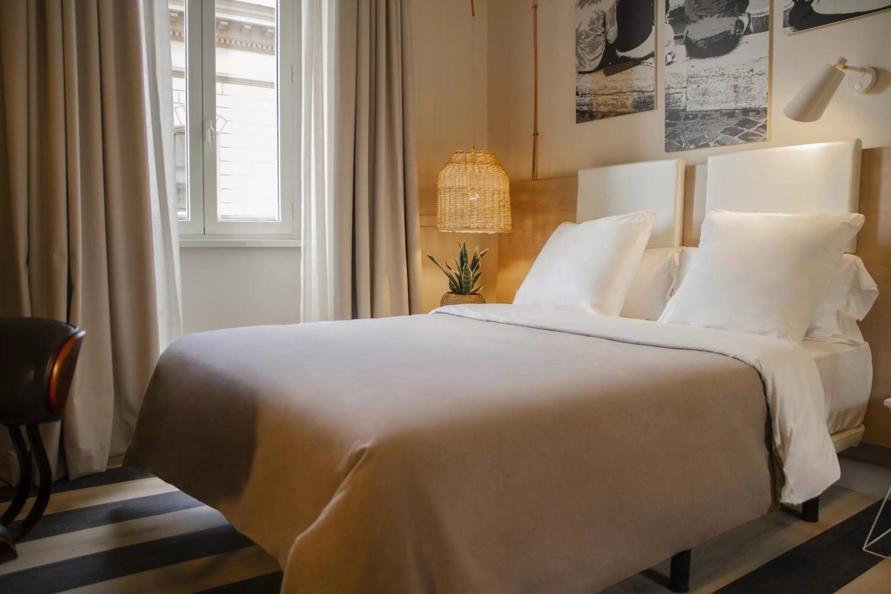 Bed in room Select Via Veneto