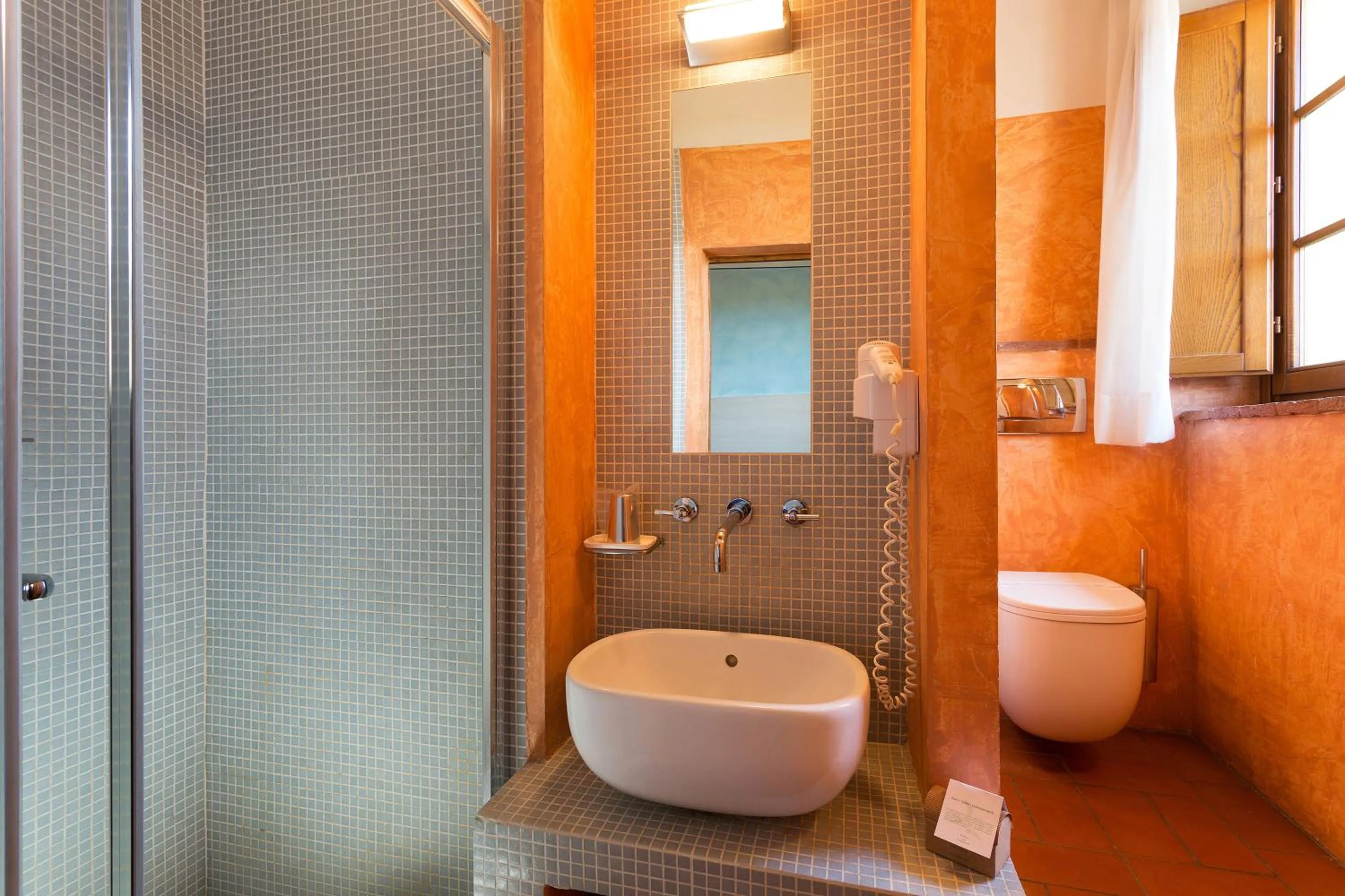 Bathroom in Hotel Le Capanne