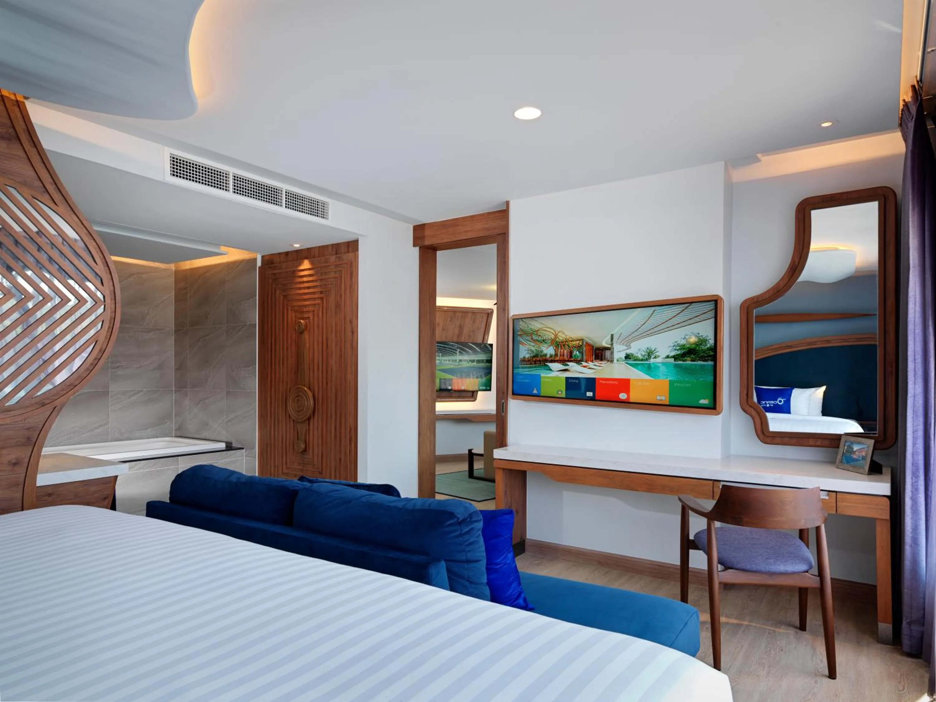 Photo of the whole room, Bed in The Oceanic Sportel Phuket - SHA Extra Plus