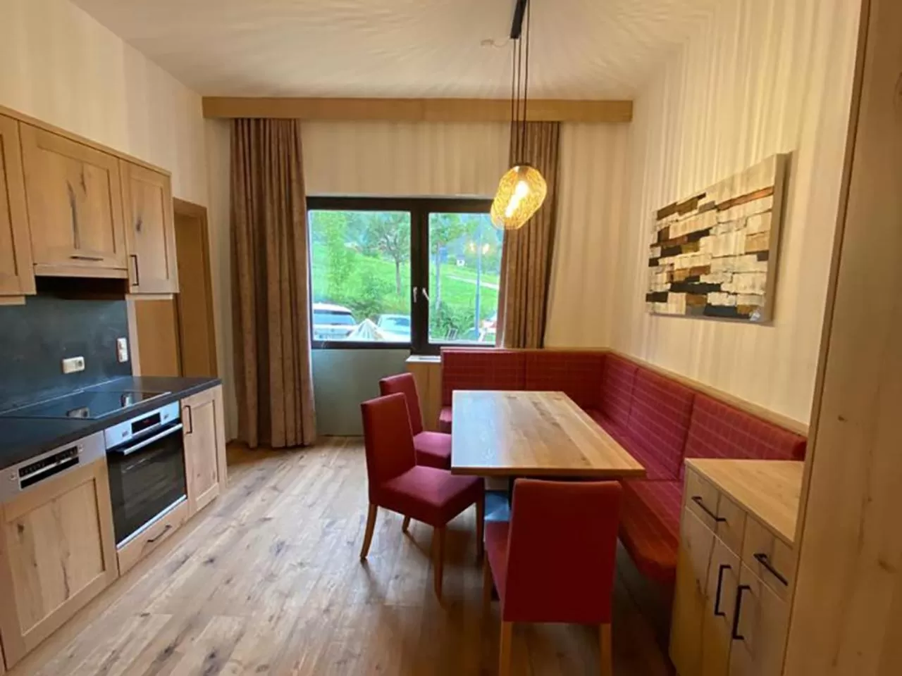kitchen, Dining Area in Appartementhaus Dachsteinblick