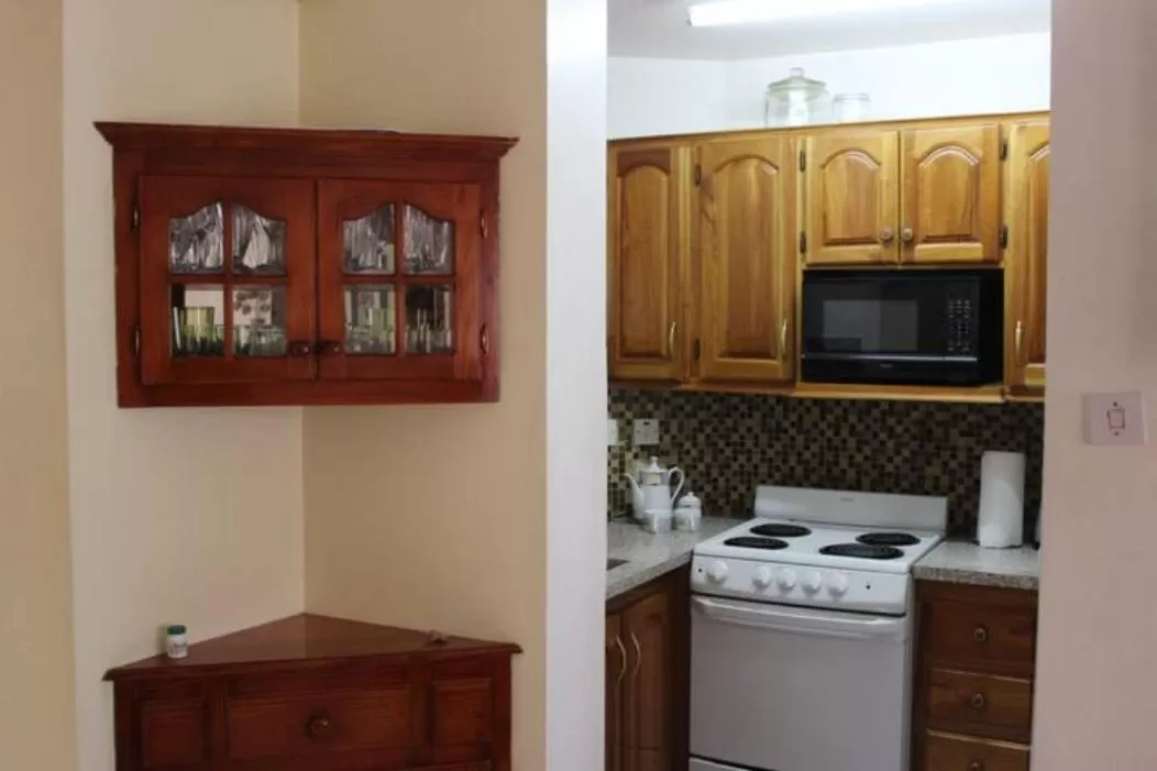 Kitchen/Kitchenette in Seacastles by the beach/pool