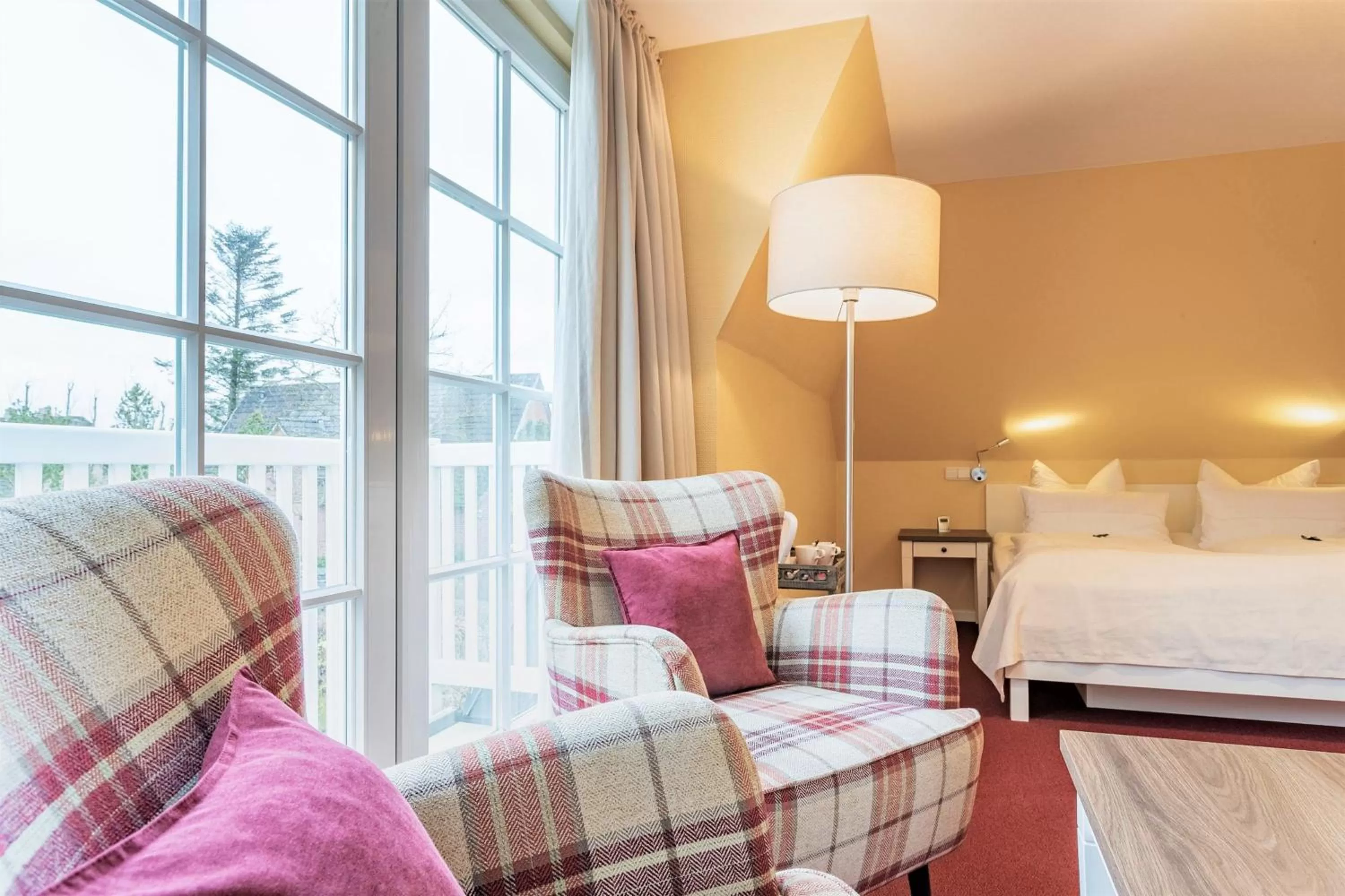 Seating area, Bed in Hotel Landhaus Ellerbrock
