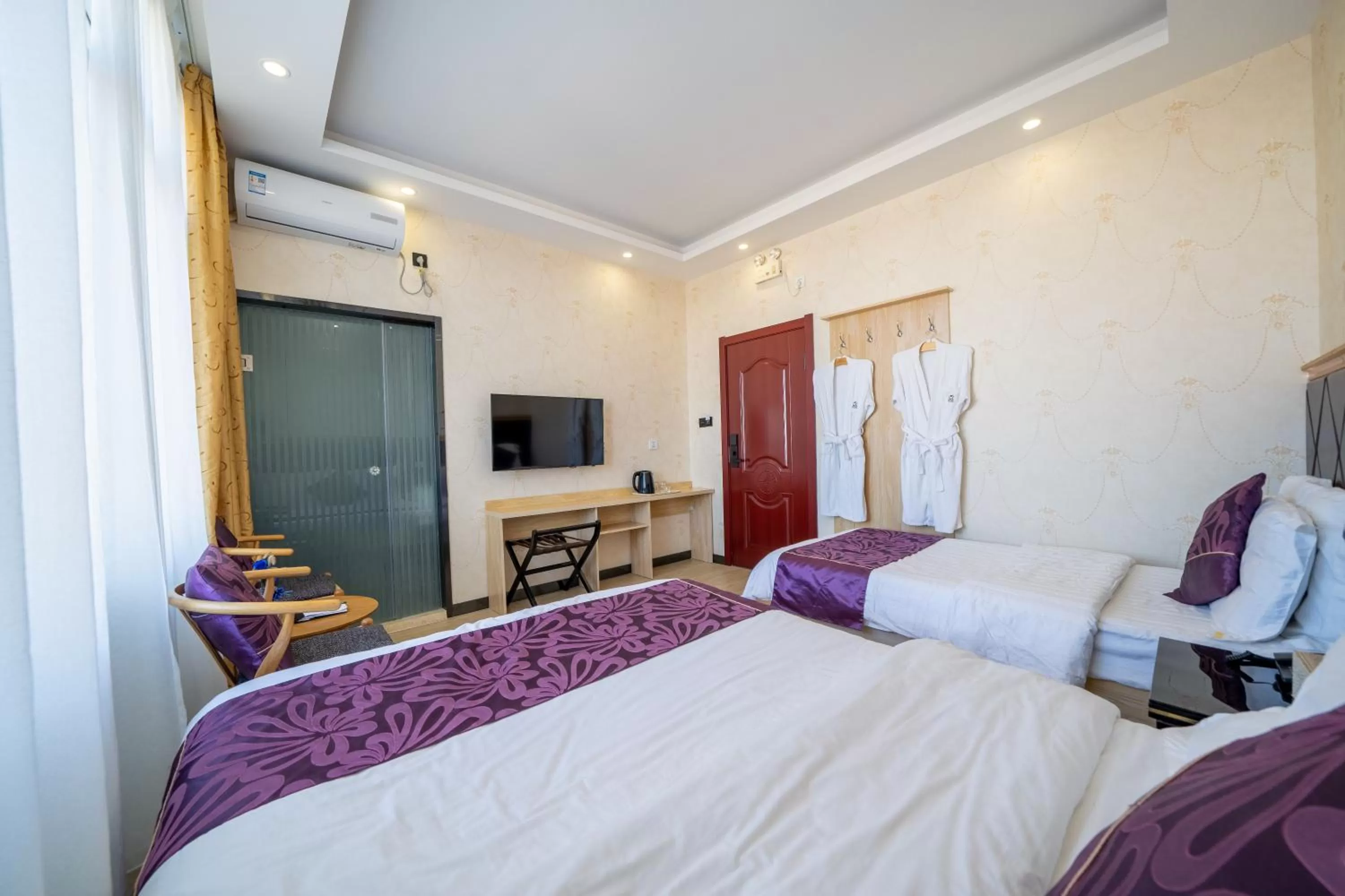 TV and multimedia, Bed in XinQihang Hotel Harbin Taiping Airport