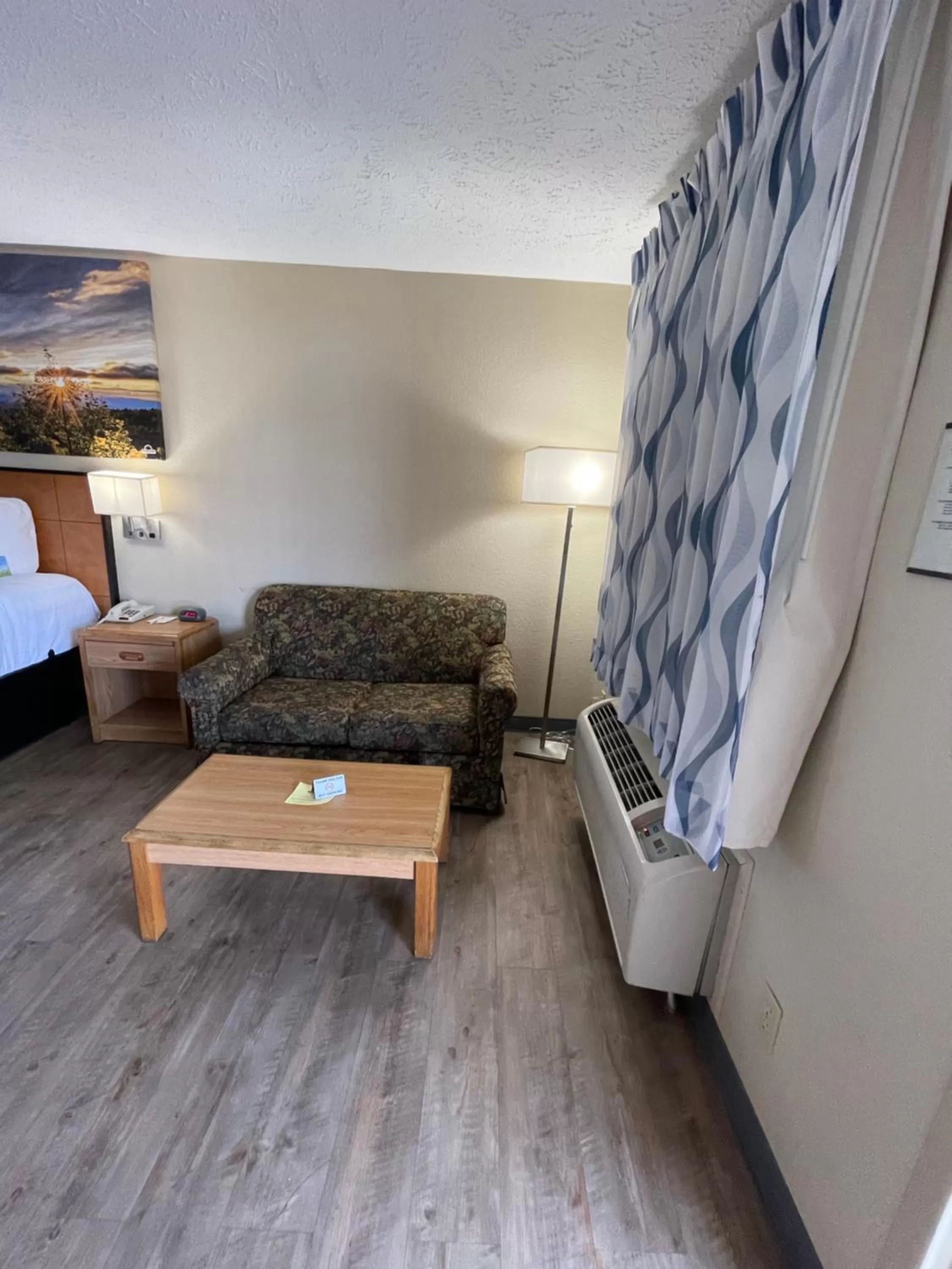 Seating area, Bed in Days Inn by Wyndham Lexington