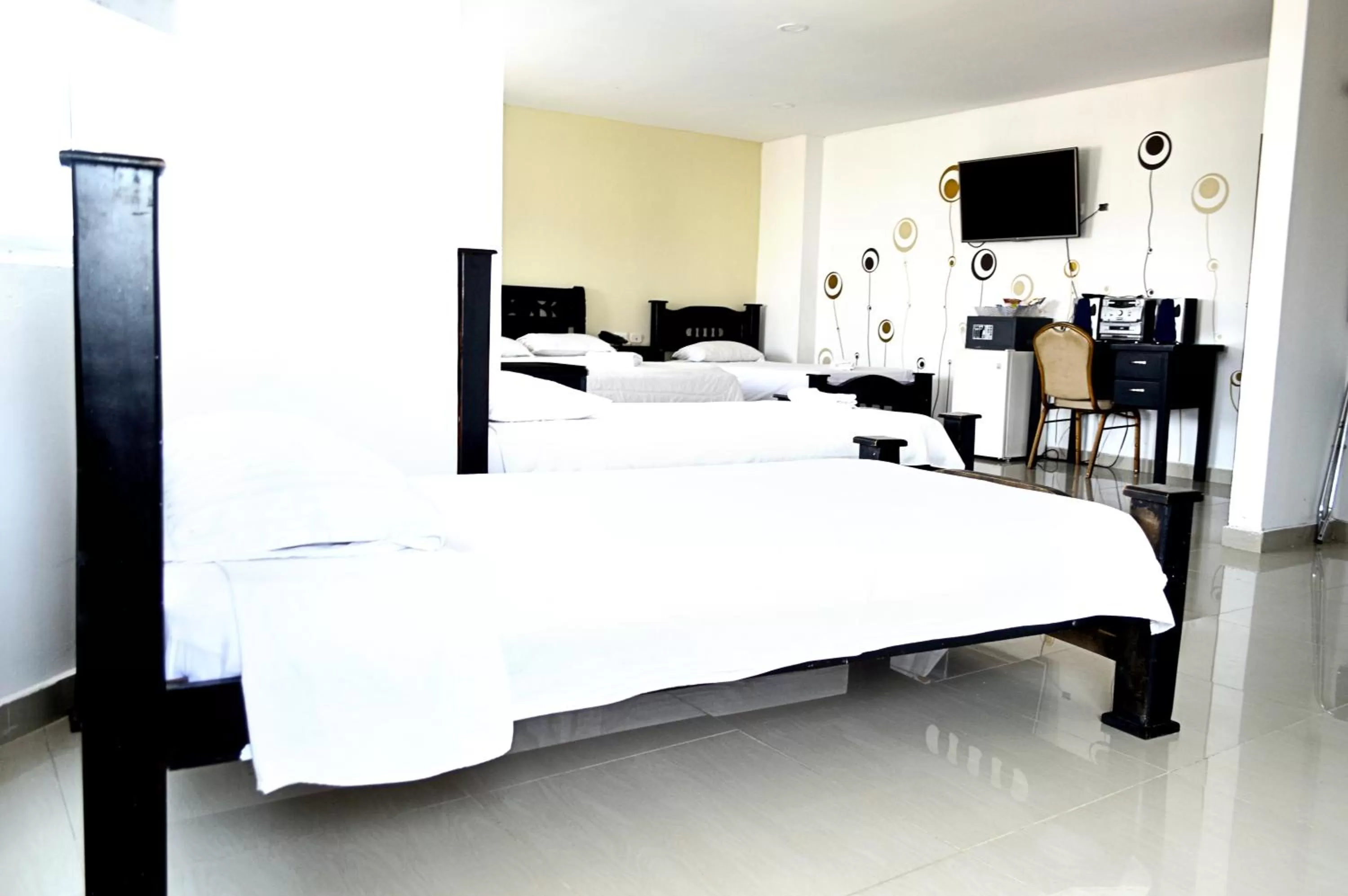 Bed in Hotel Intersuites