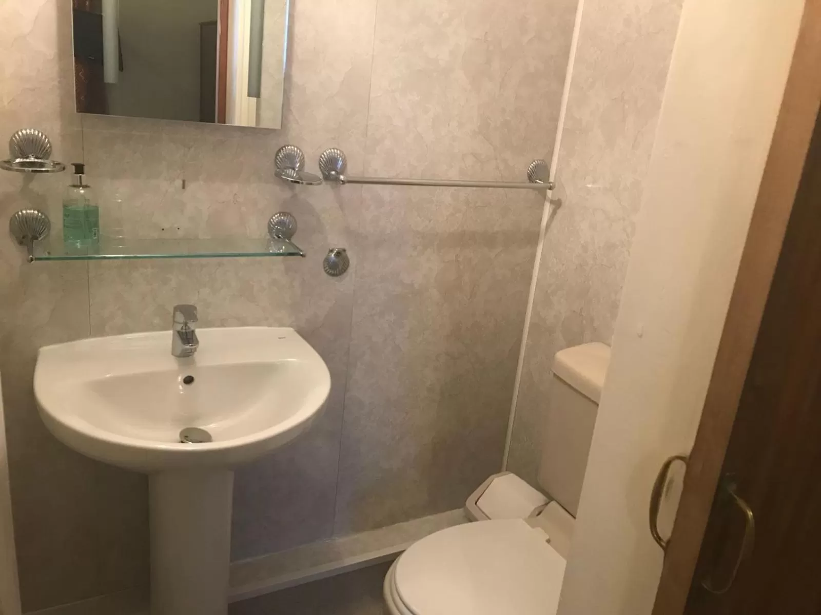 Toilet in Ambassador Hotel