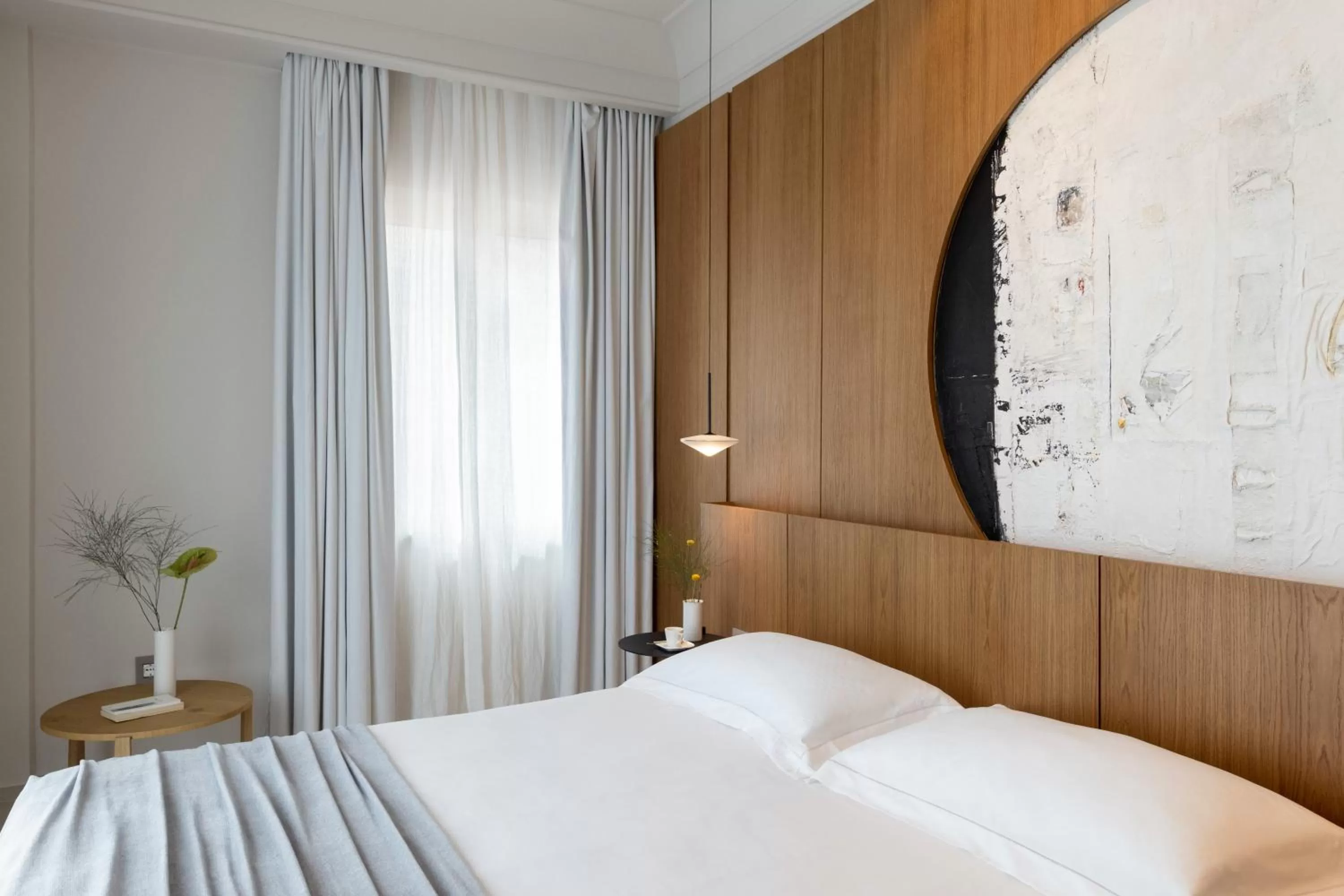 Bed in Taodomus Boutique Hotel