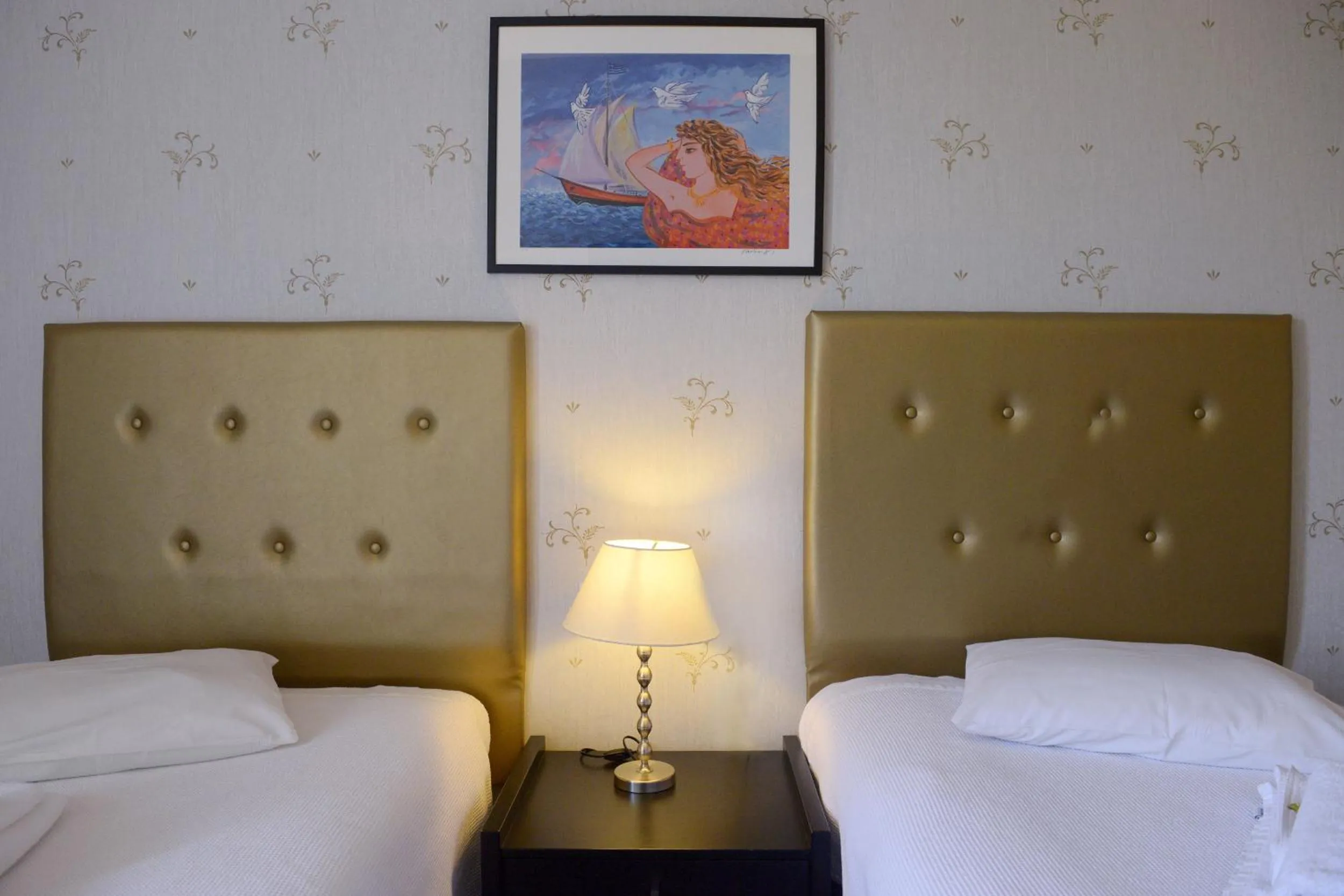 Bed in Phidias Hotel