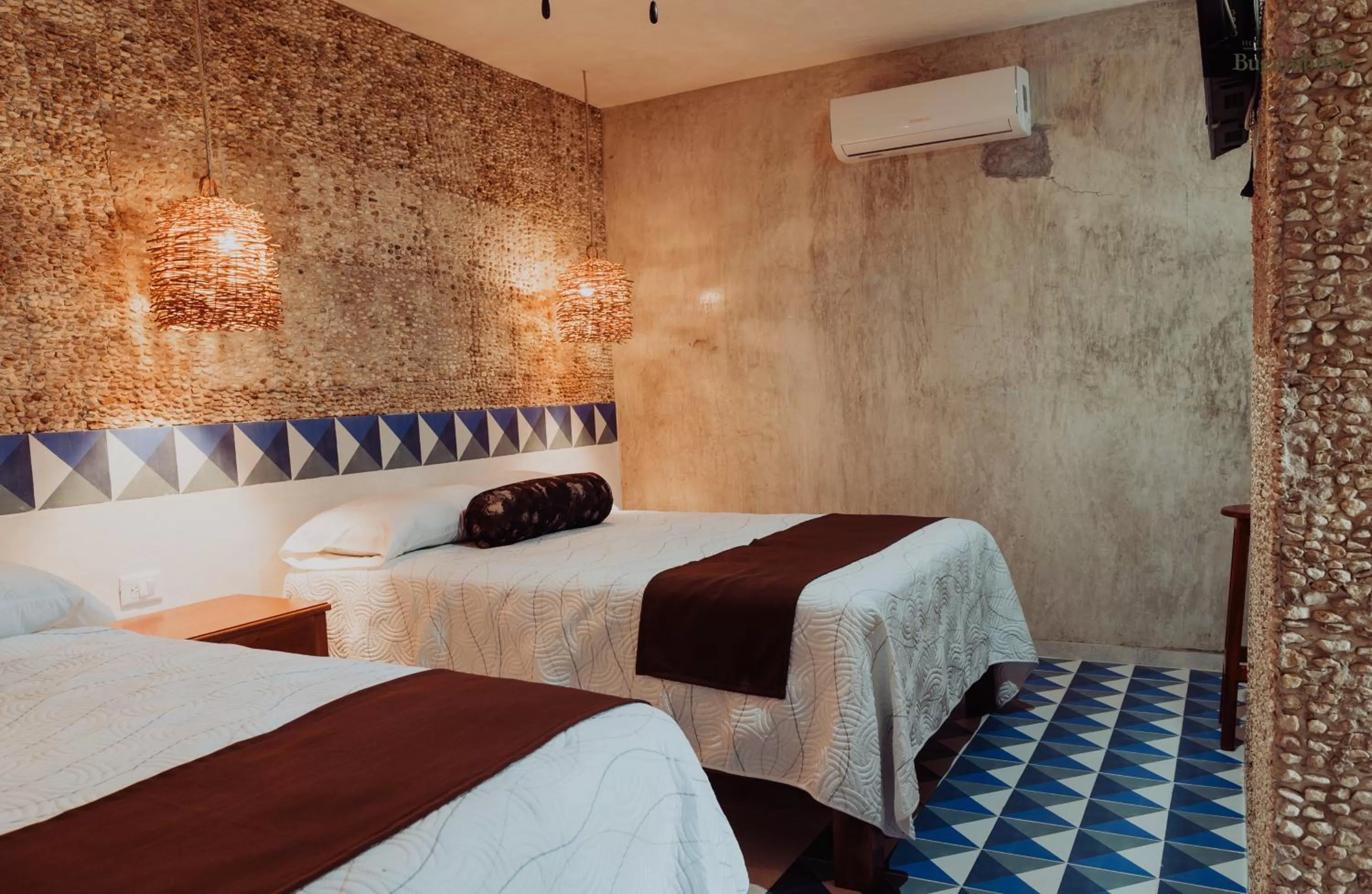 Bed in Hotel Boutique Bugambilias