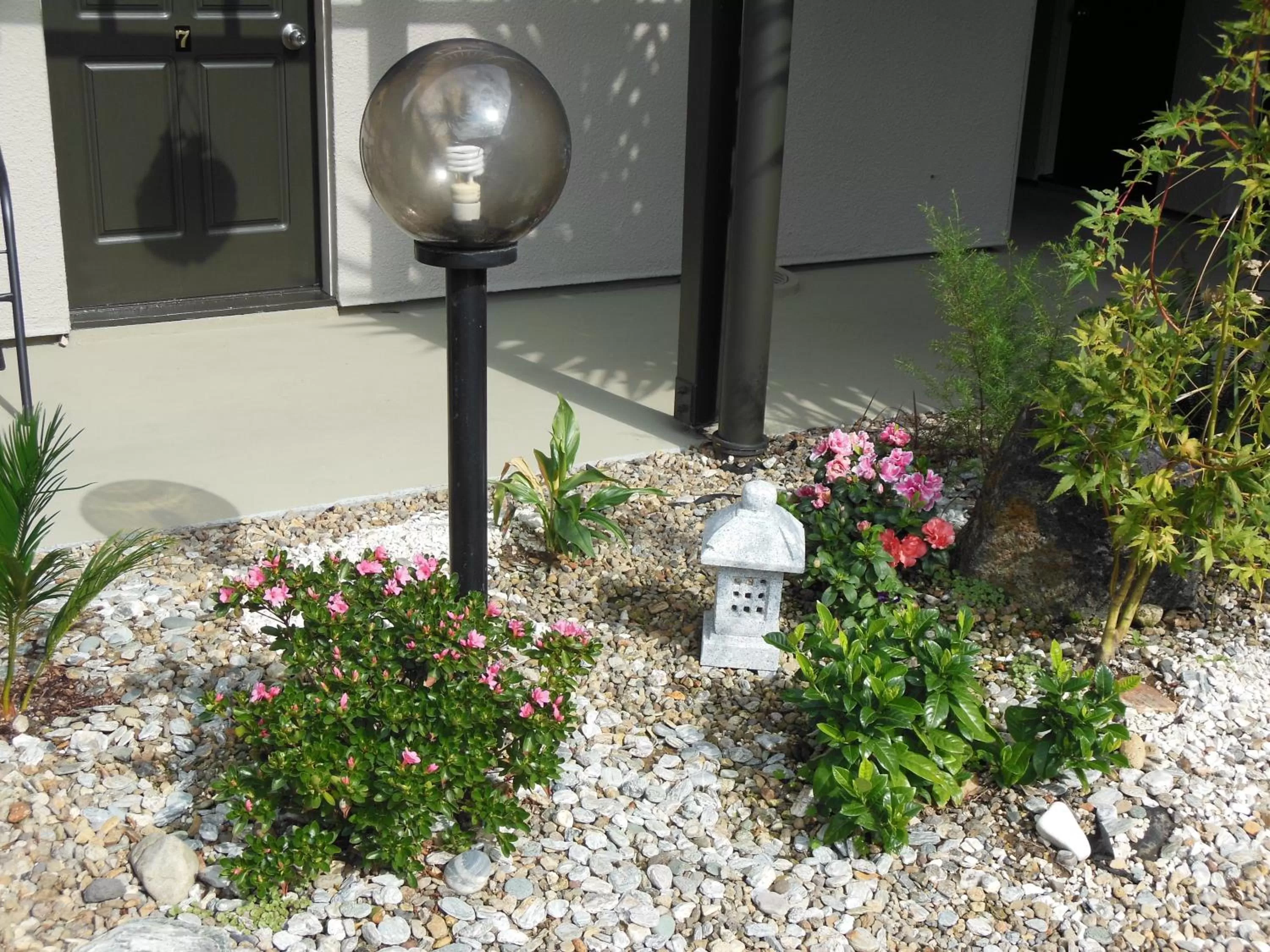 Day in ASURE Camelot Arms Motor Lodge