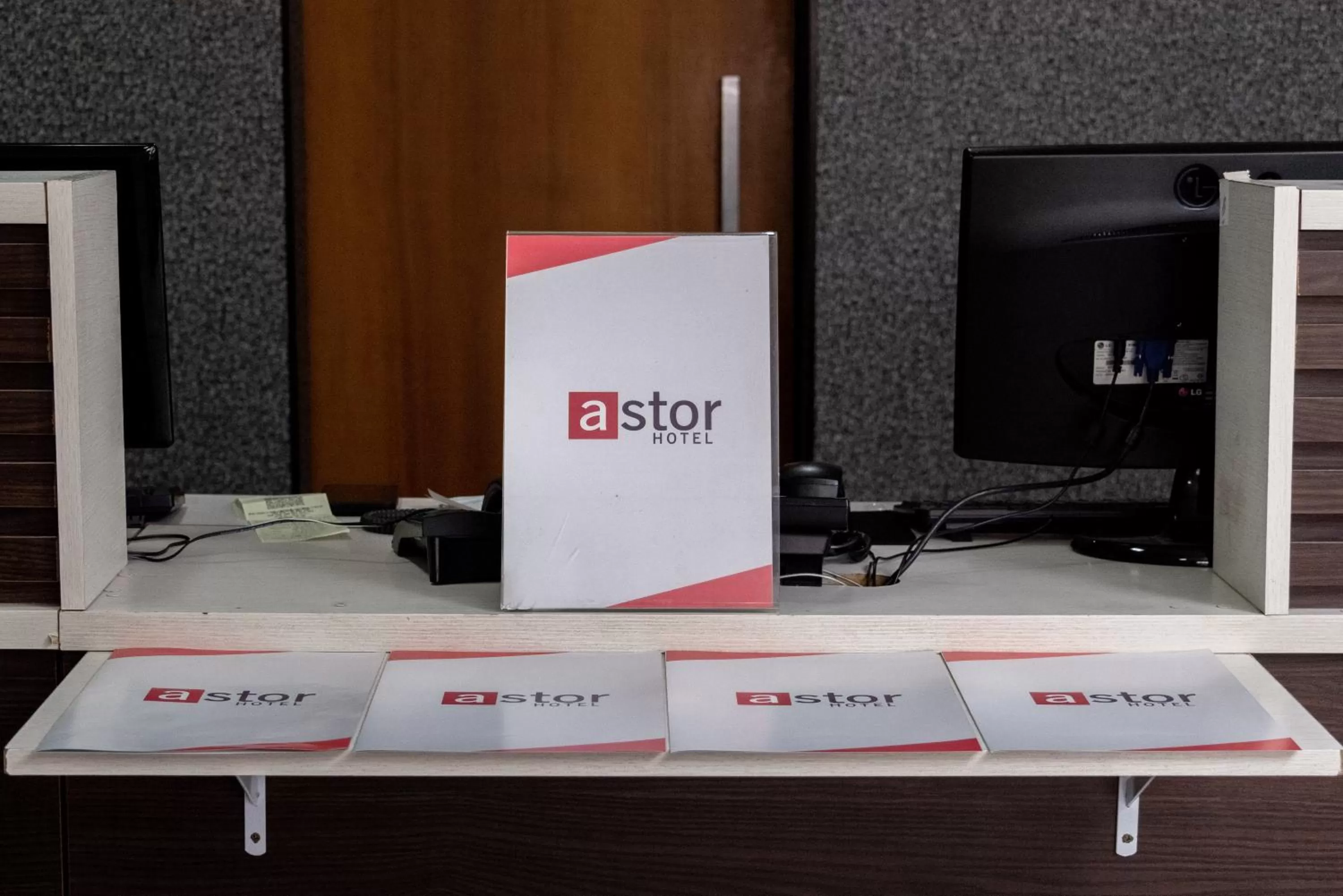 Lobby or reception in Astor Hotel