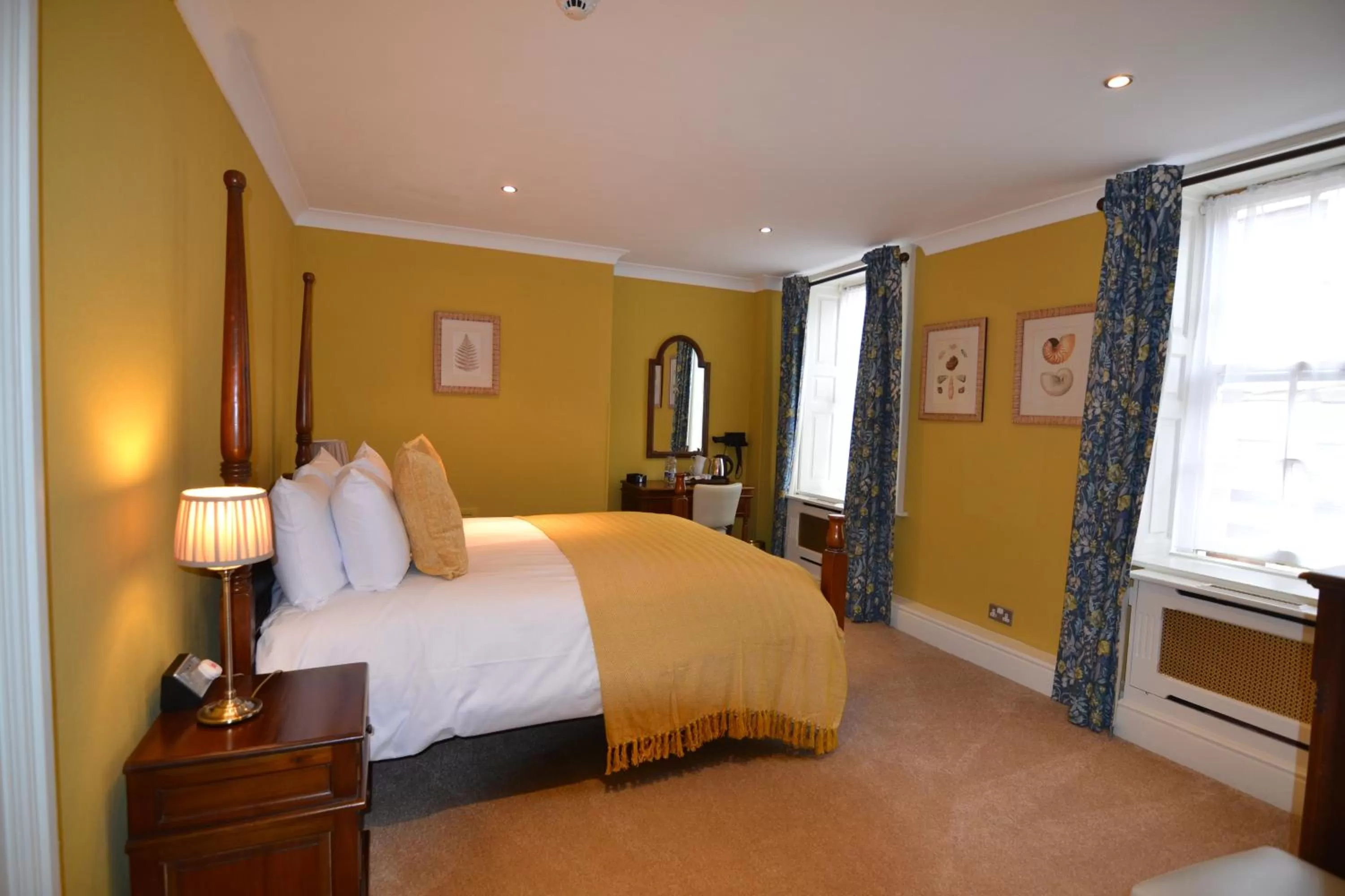 Bed in Angel and Royal Hotel