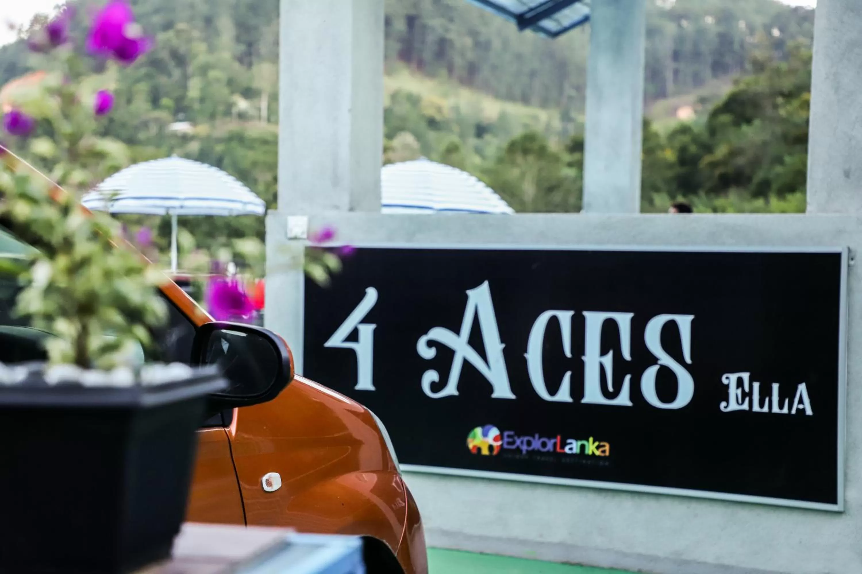 Property logo or sign in 4 Aces Ella