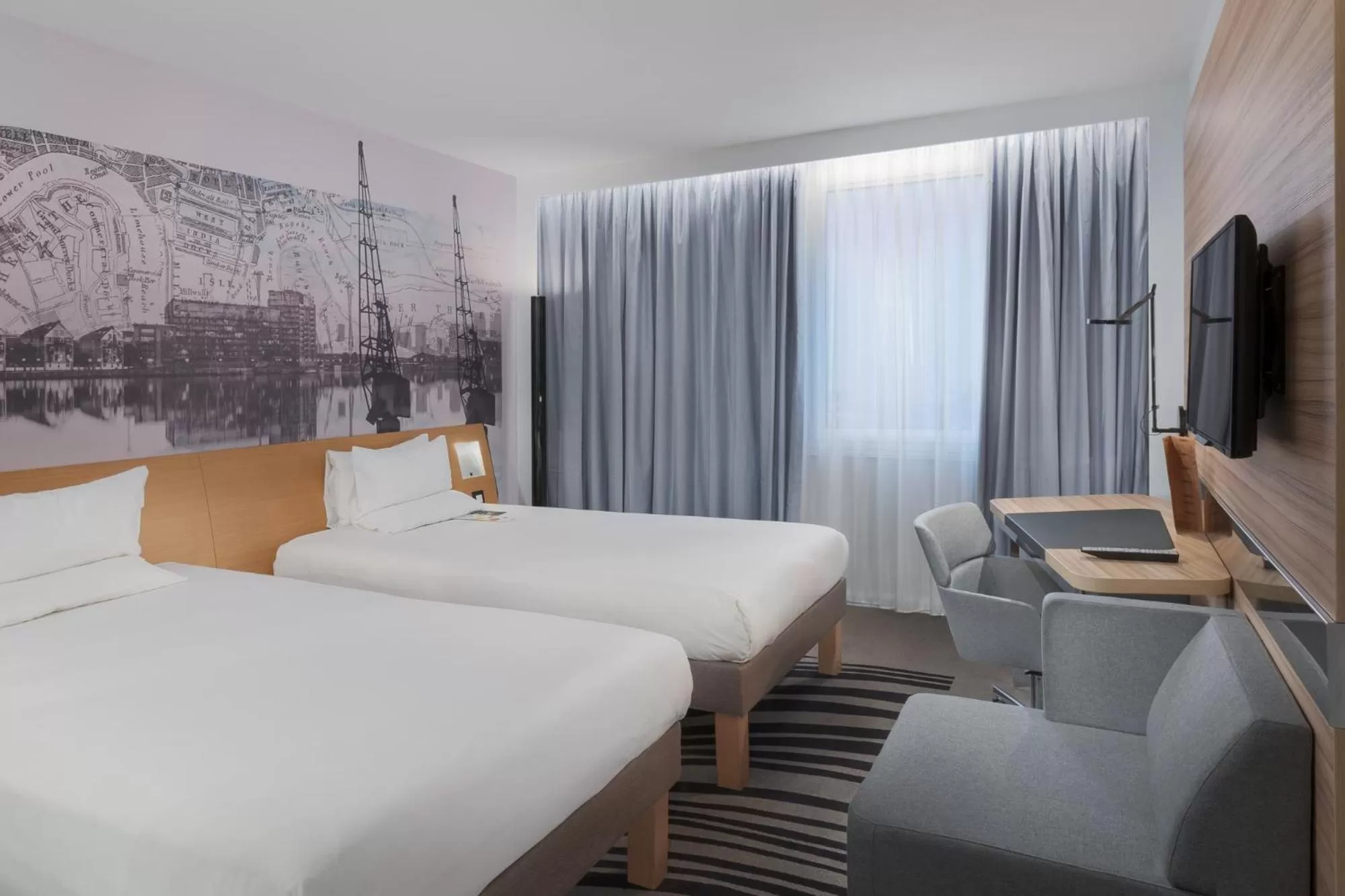 Photo of the whole room, Bed in Novotel London Excel