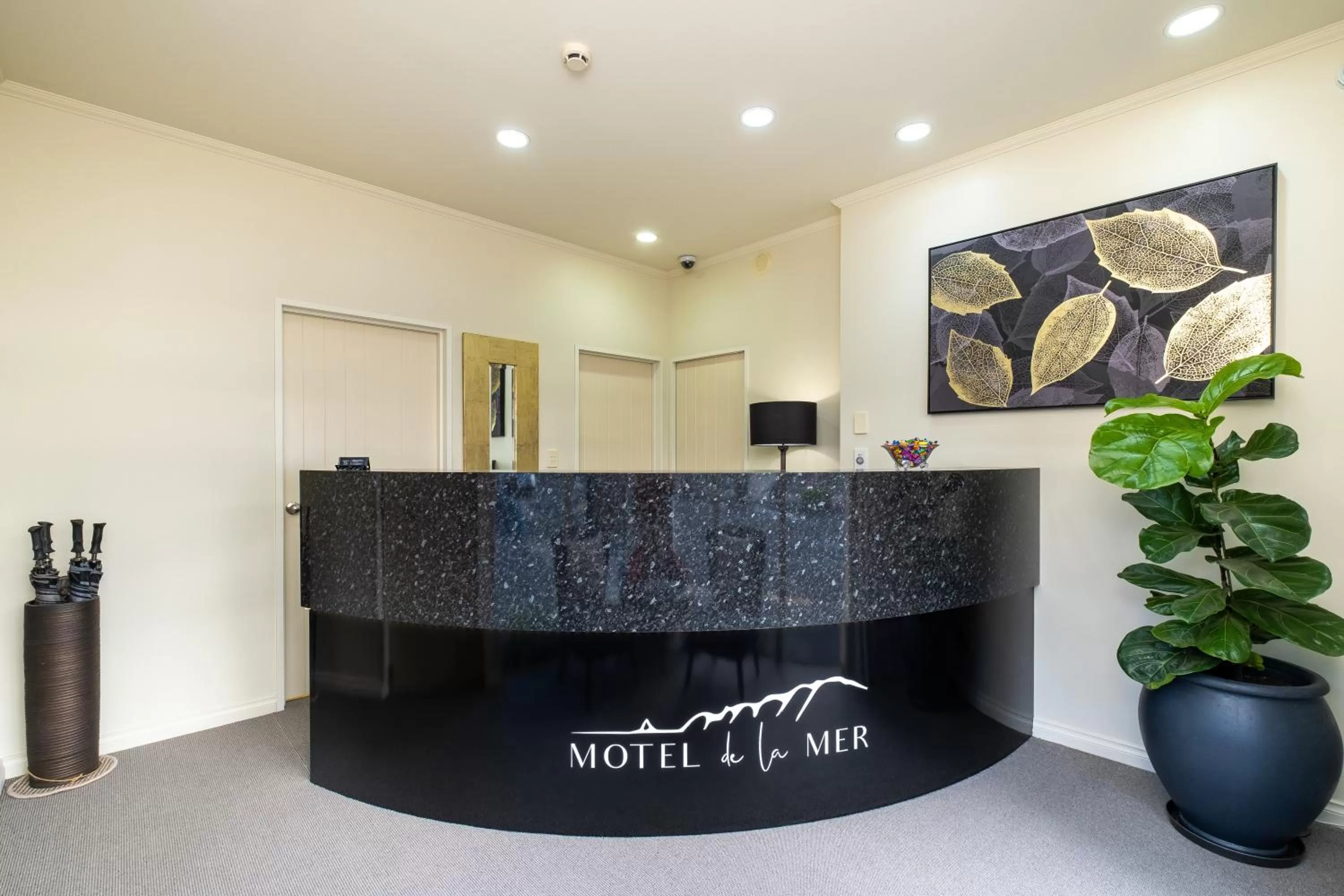 Property logo or sign in Motel de la Mer