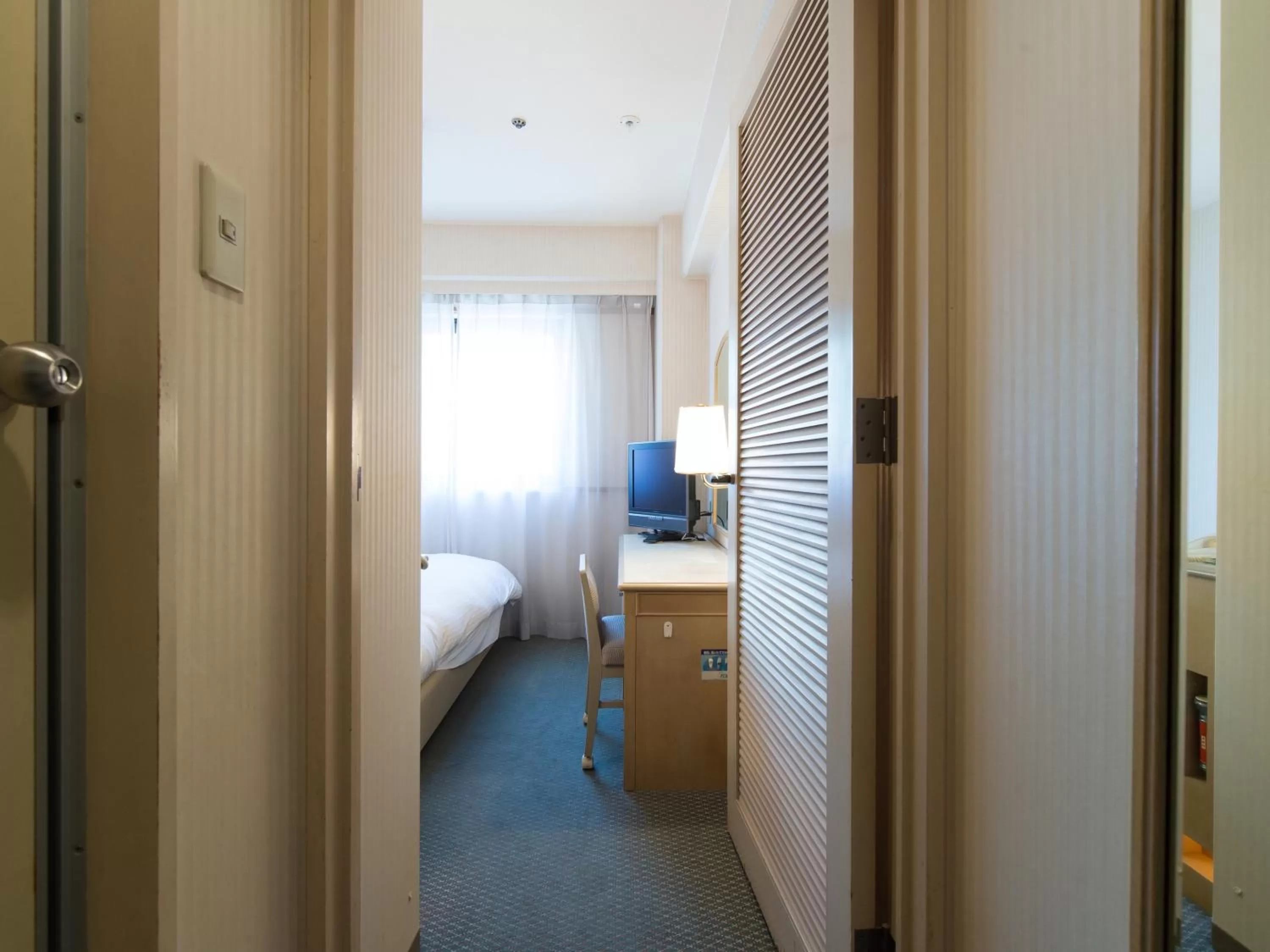 Photo of the whole room, Bed in Tabist Hotel Tetora Kitakyushu