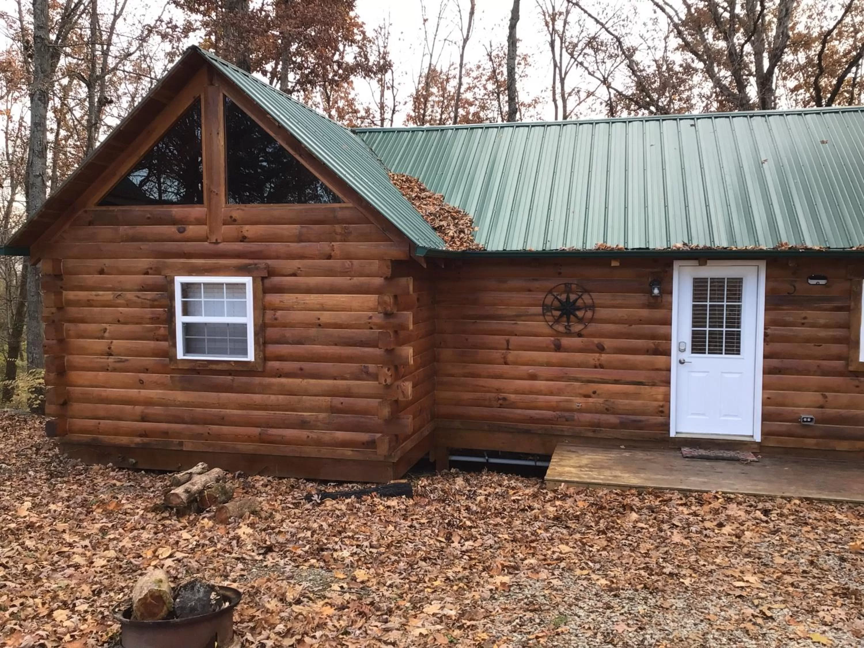 Property building in Kozy Haven Log Cabin Rentals