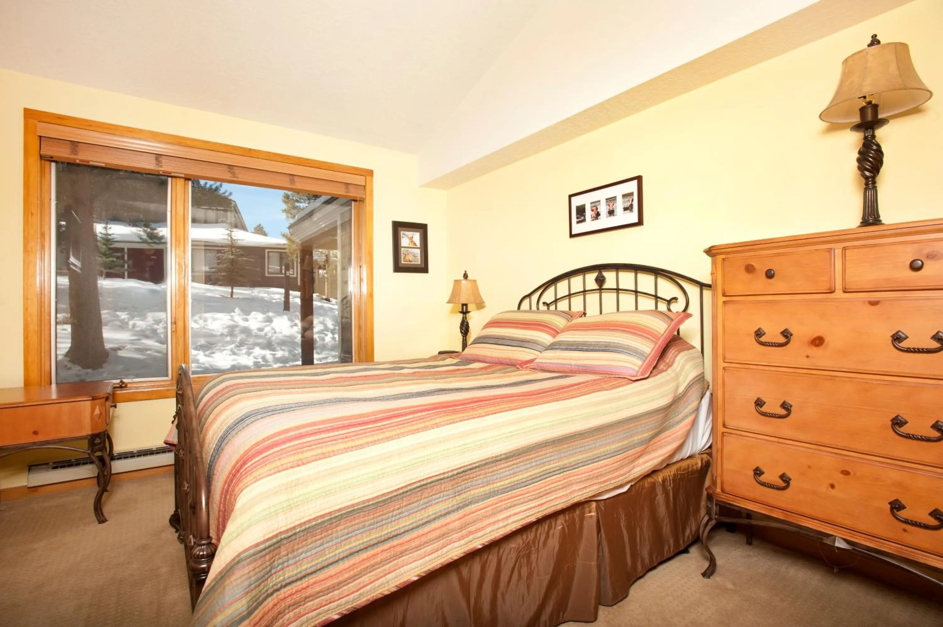 Bed in Evergreen Condominiums by Keystone Resort