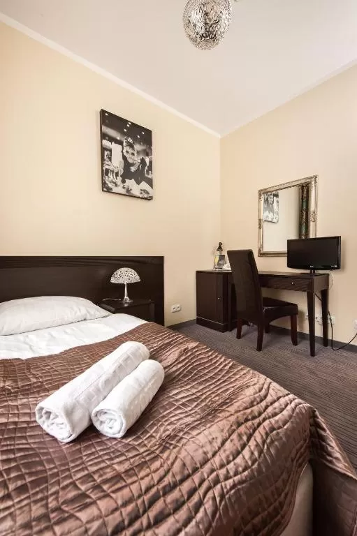 Bed in Hotel Willa Adriana