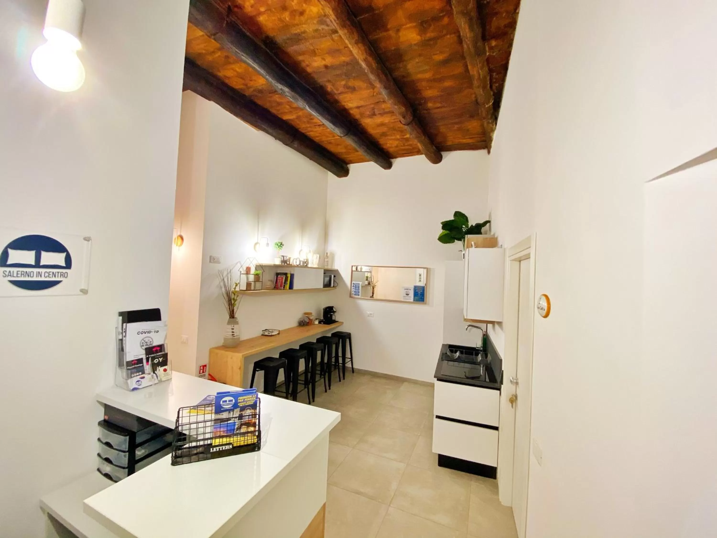 Communal lounge/ TV room in B&B Salerno IN Centro