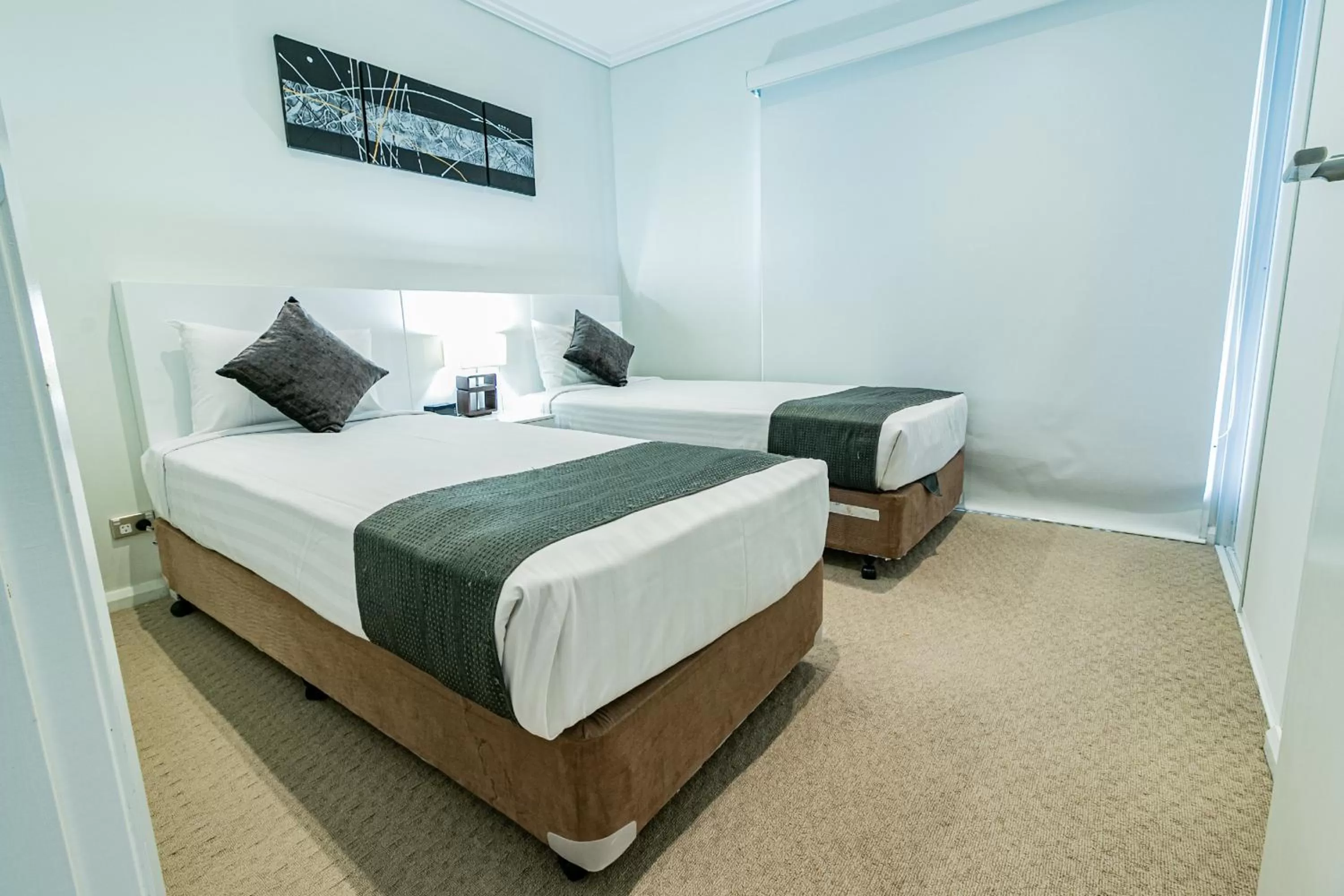 Bed in Absolute Beachfront Opal Cove Resort