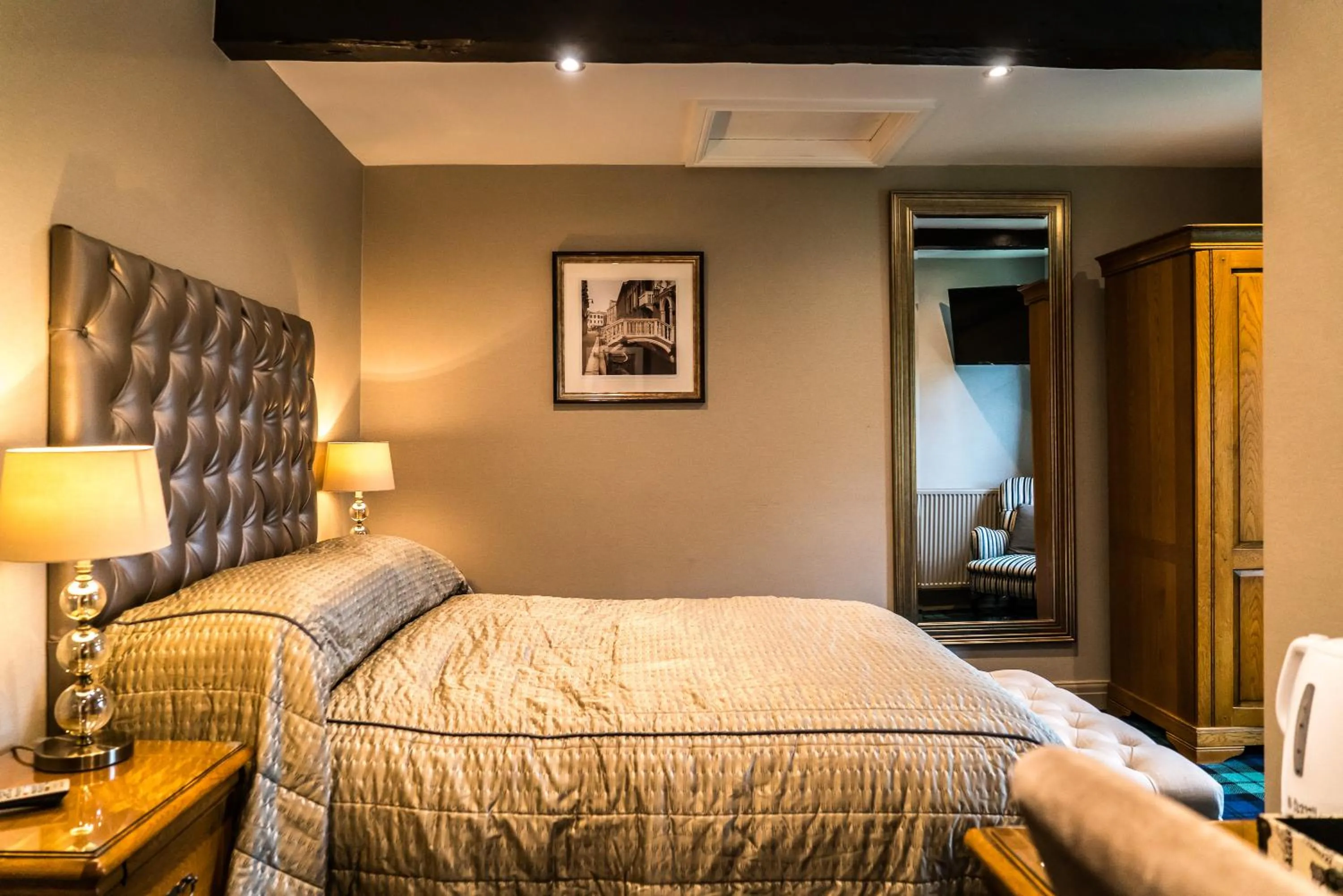 Bed in The Mews Hotel