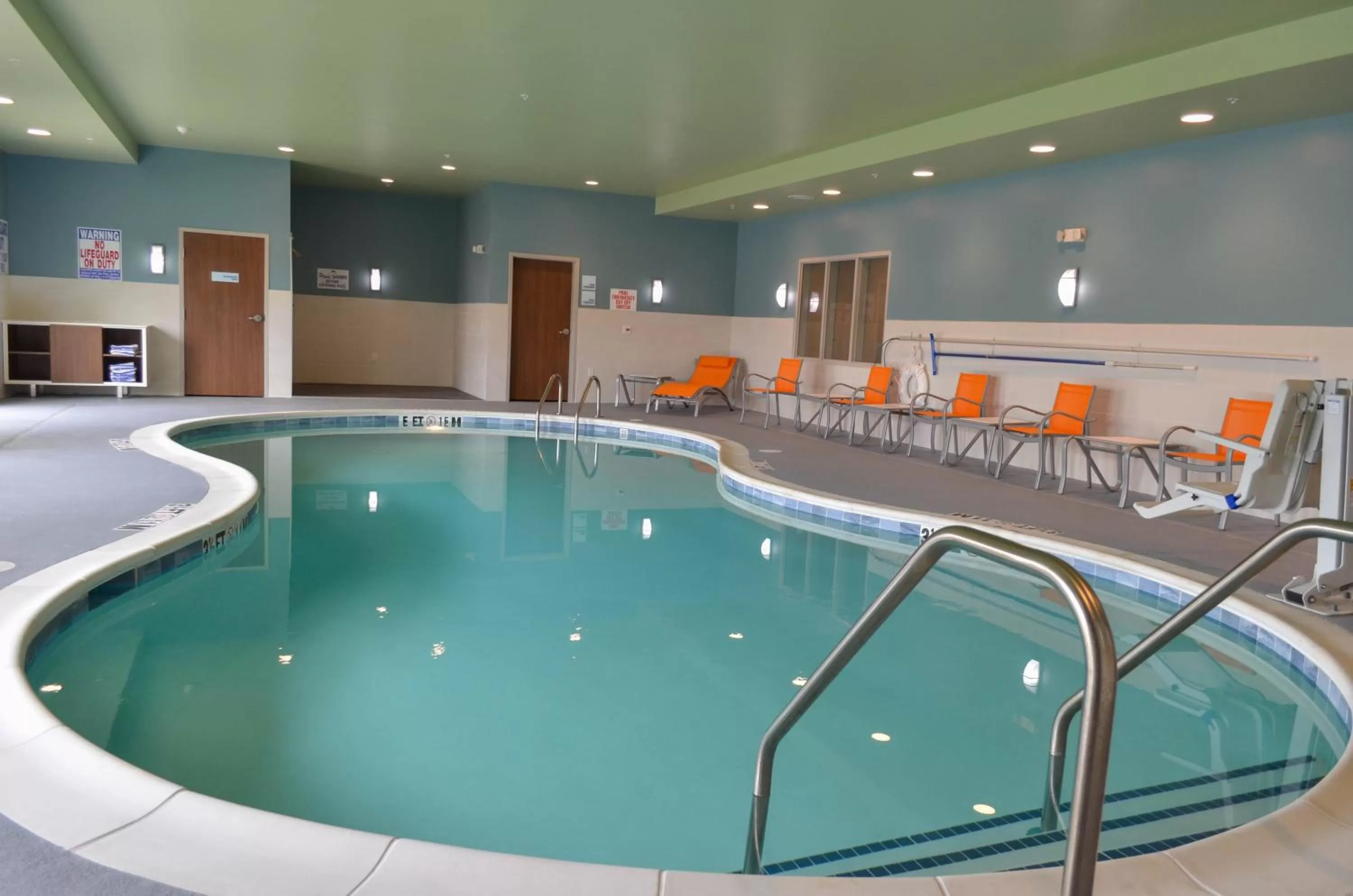 Swimming pool in Holiday Inn Express & Suites - Charlotte NE - University Area by IHG